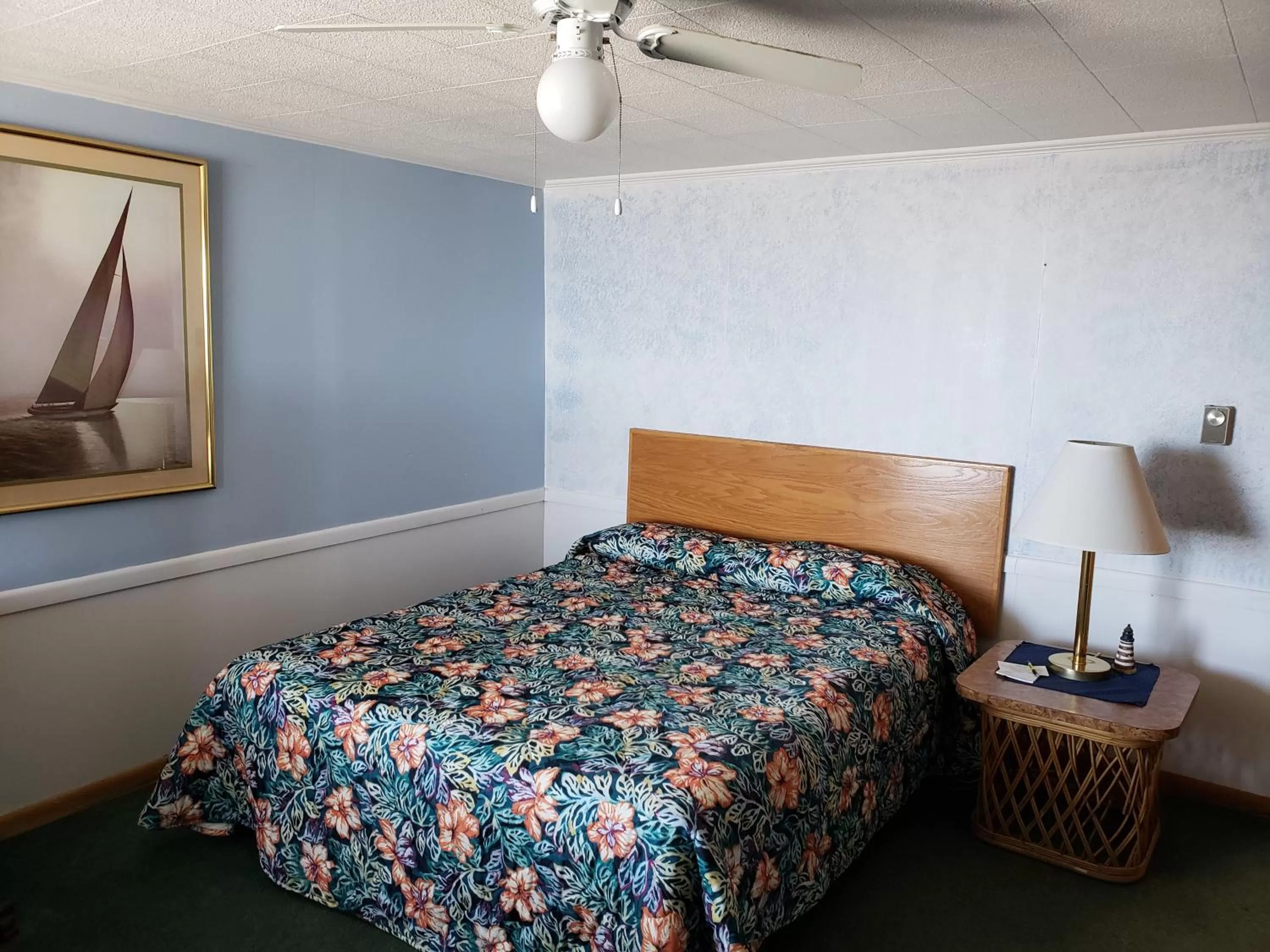 Bed in Algoma Beach Motel