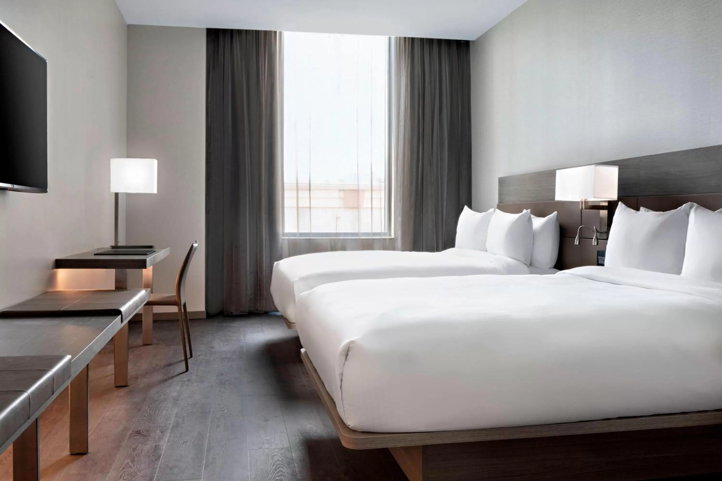 Queen Room with Two Queen Beds and City View - Hearing Accessible in AC Hotel by Marriott Grand Rapids Downtown