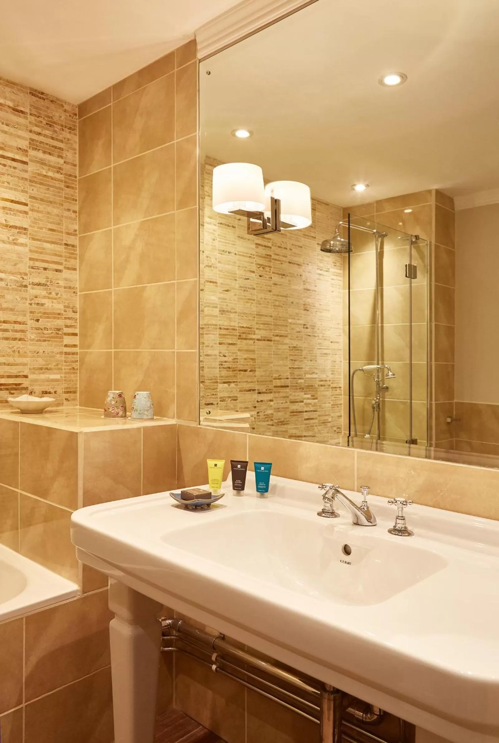 Bathroom in Ockenden Manor Hotel & Spa