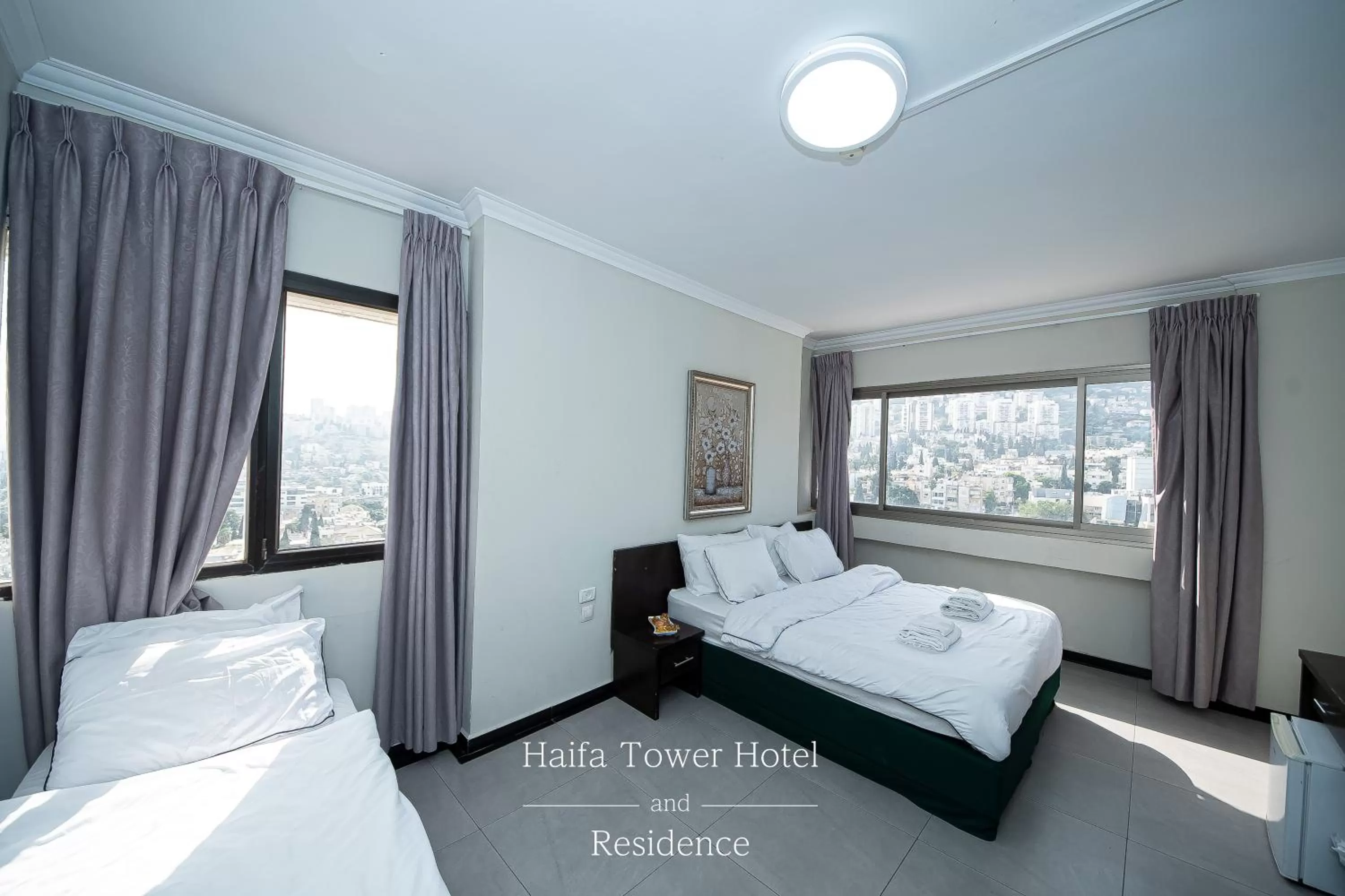 Bed in Haifa Tower Hotel - מלון מגדל חיפה