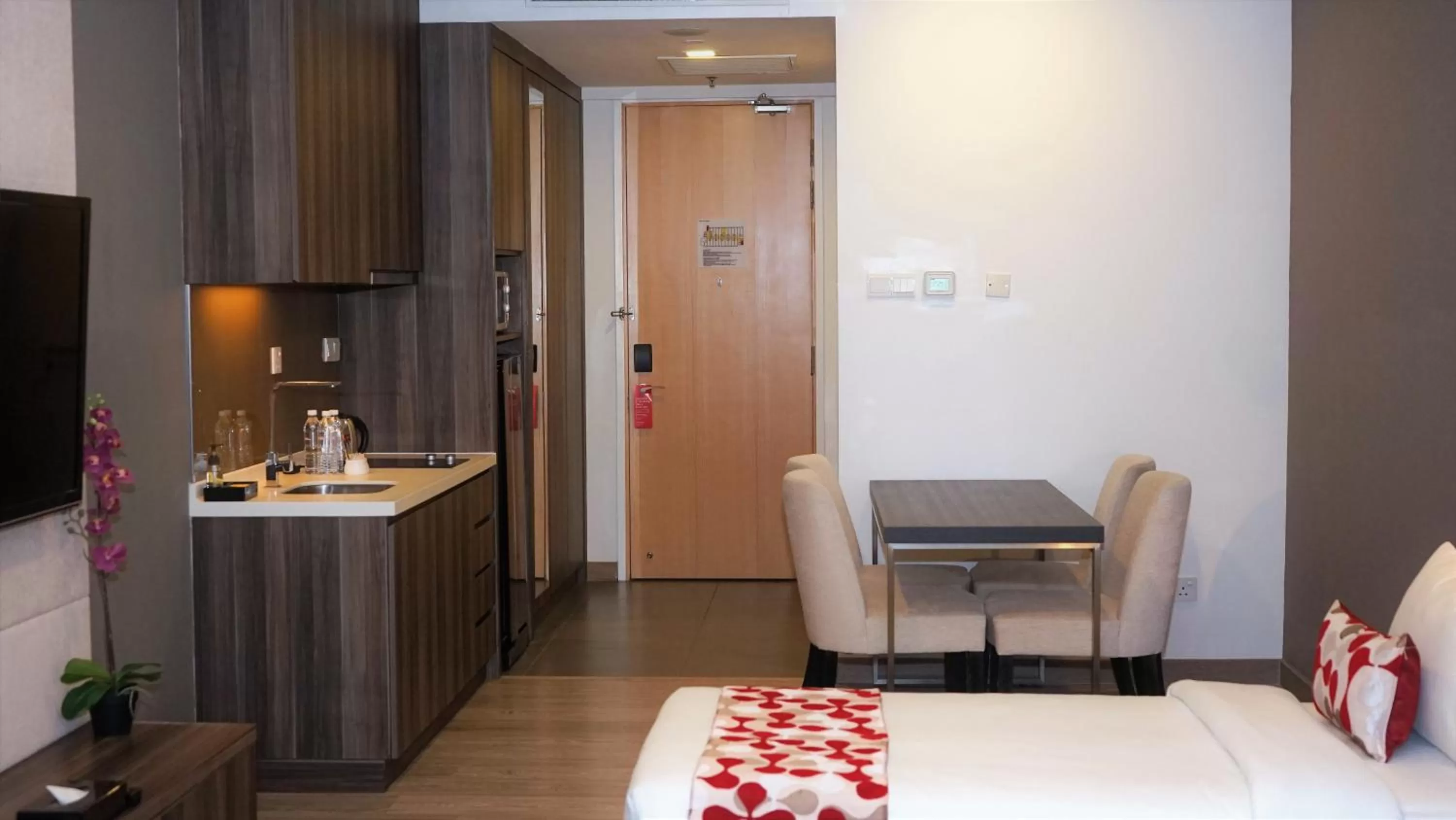 Dining area, Bed in Ramada Suites by Wyndham Kuala Lumpur City Centre