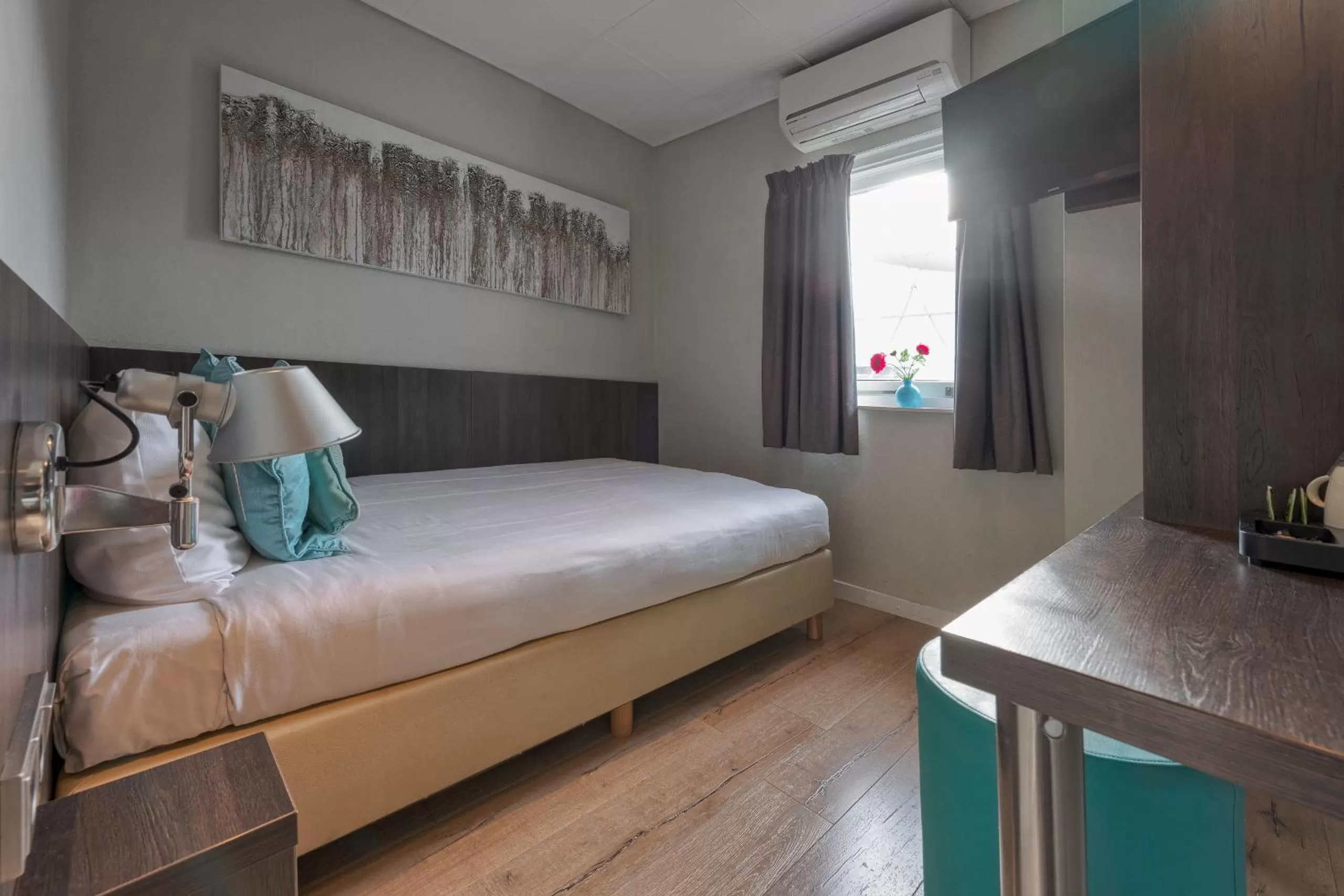 Bed in Hotel Damsquare