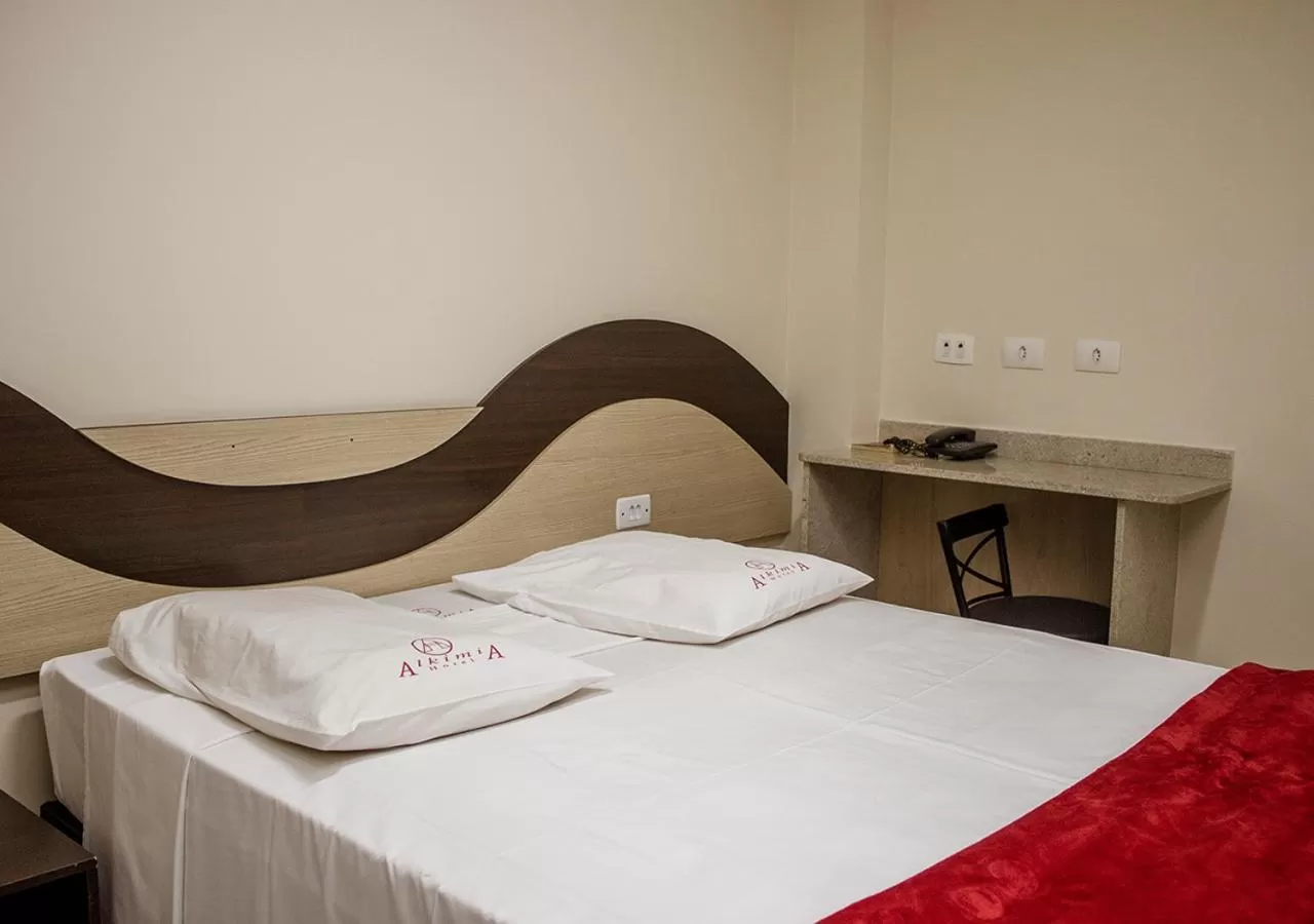 Bed in Alkimia Hotel