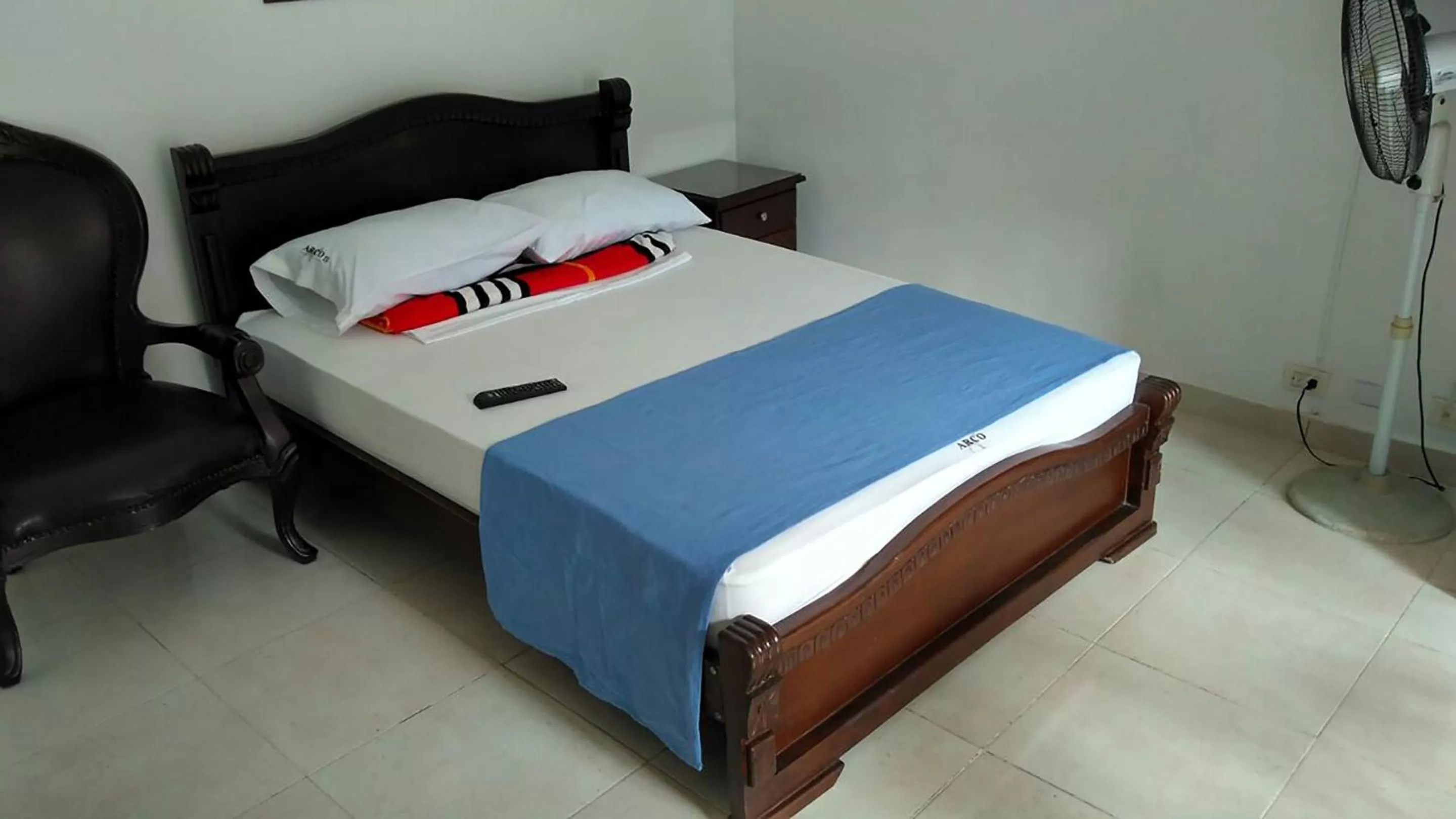 Bed in Arco Apartasuites