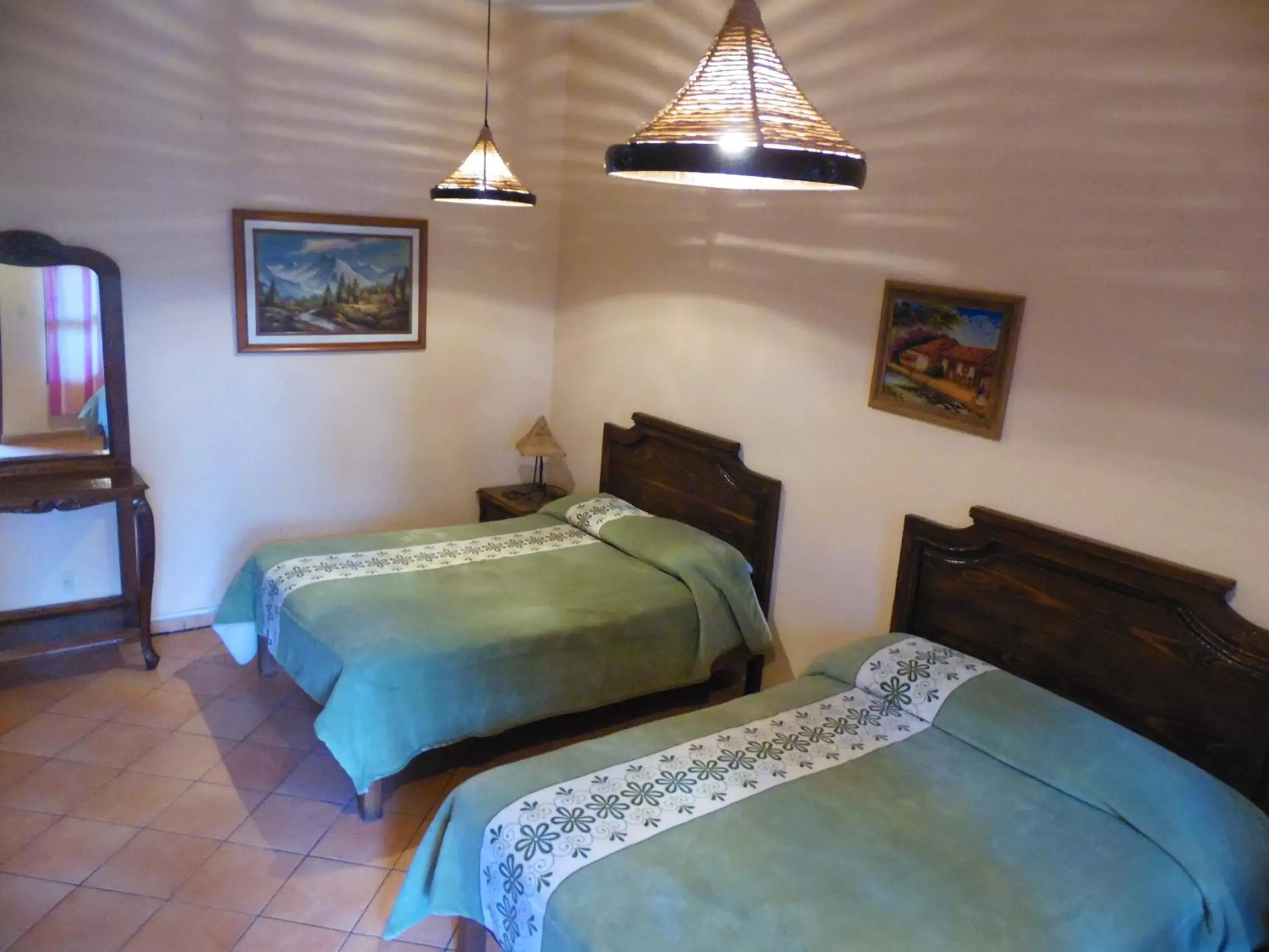 Deluxe Queen Room with Two Queen Beds in Hotel Plaza del Sol Deluxe Queen Room with Two Queen Beds in Hotel Plaza del Sol