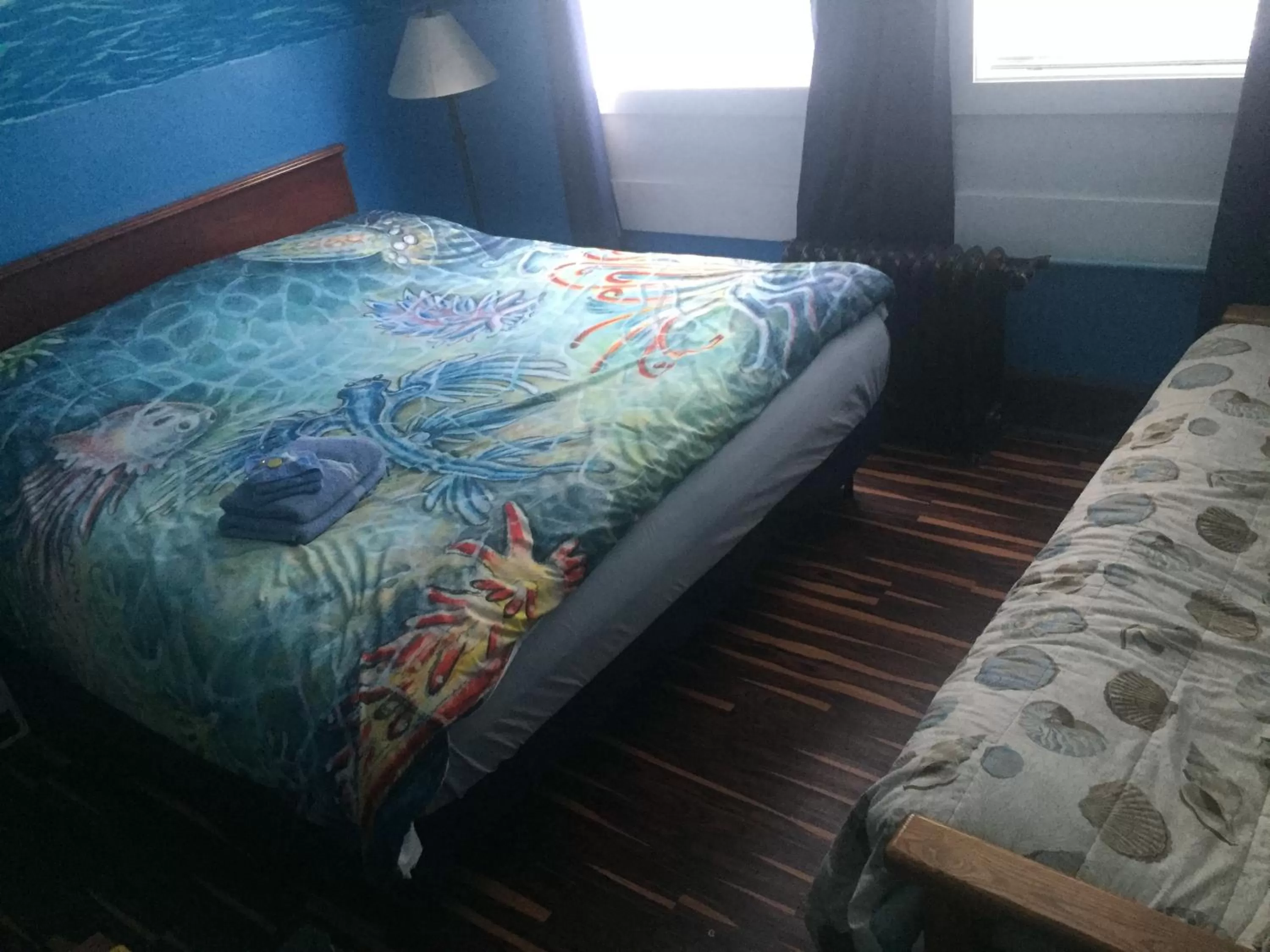 Bed in The Pirate Haus Inn