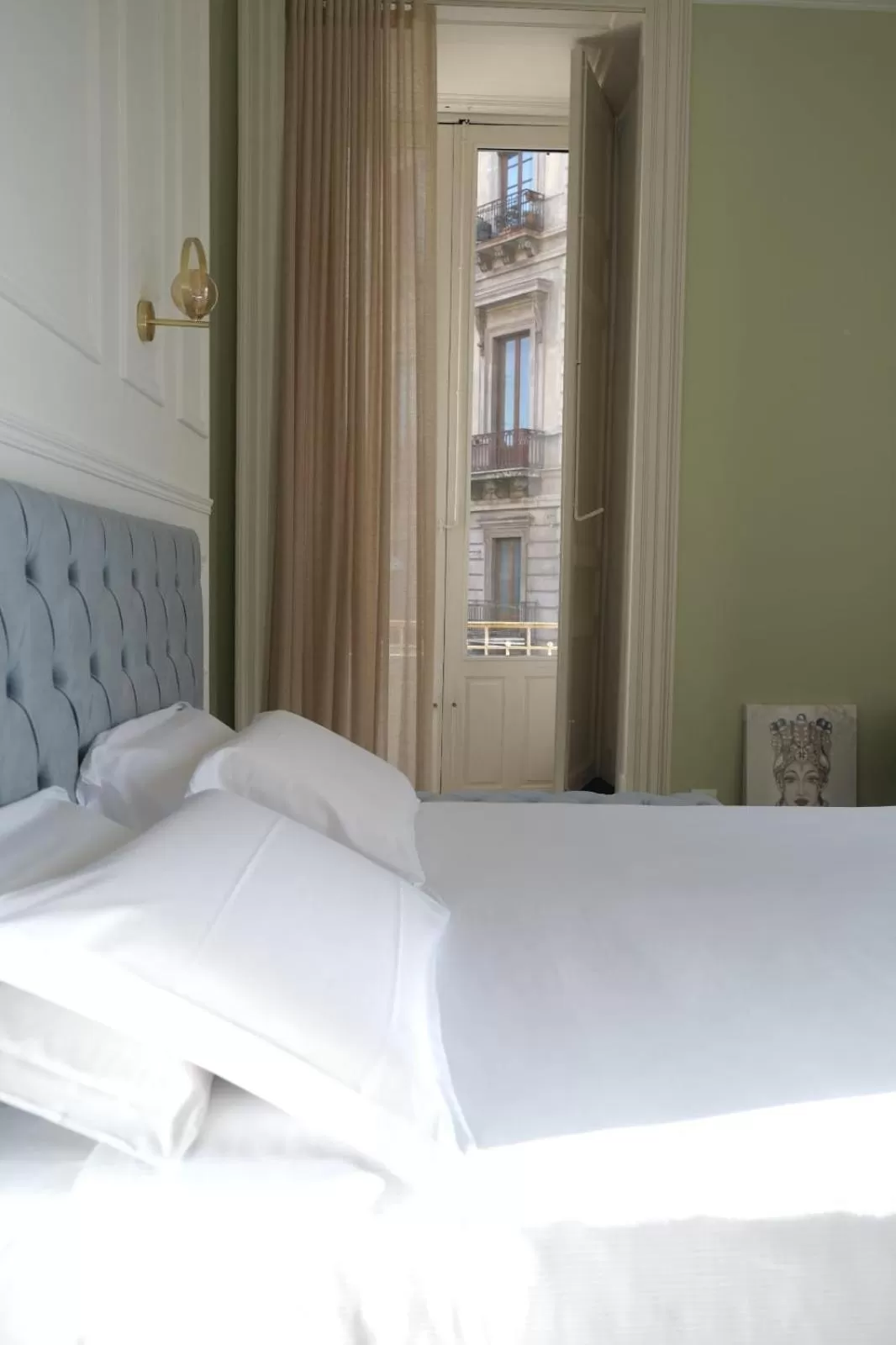 Bed in Toscano Palace Luxury Rooms Catania