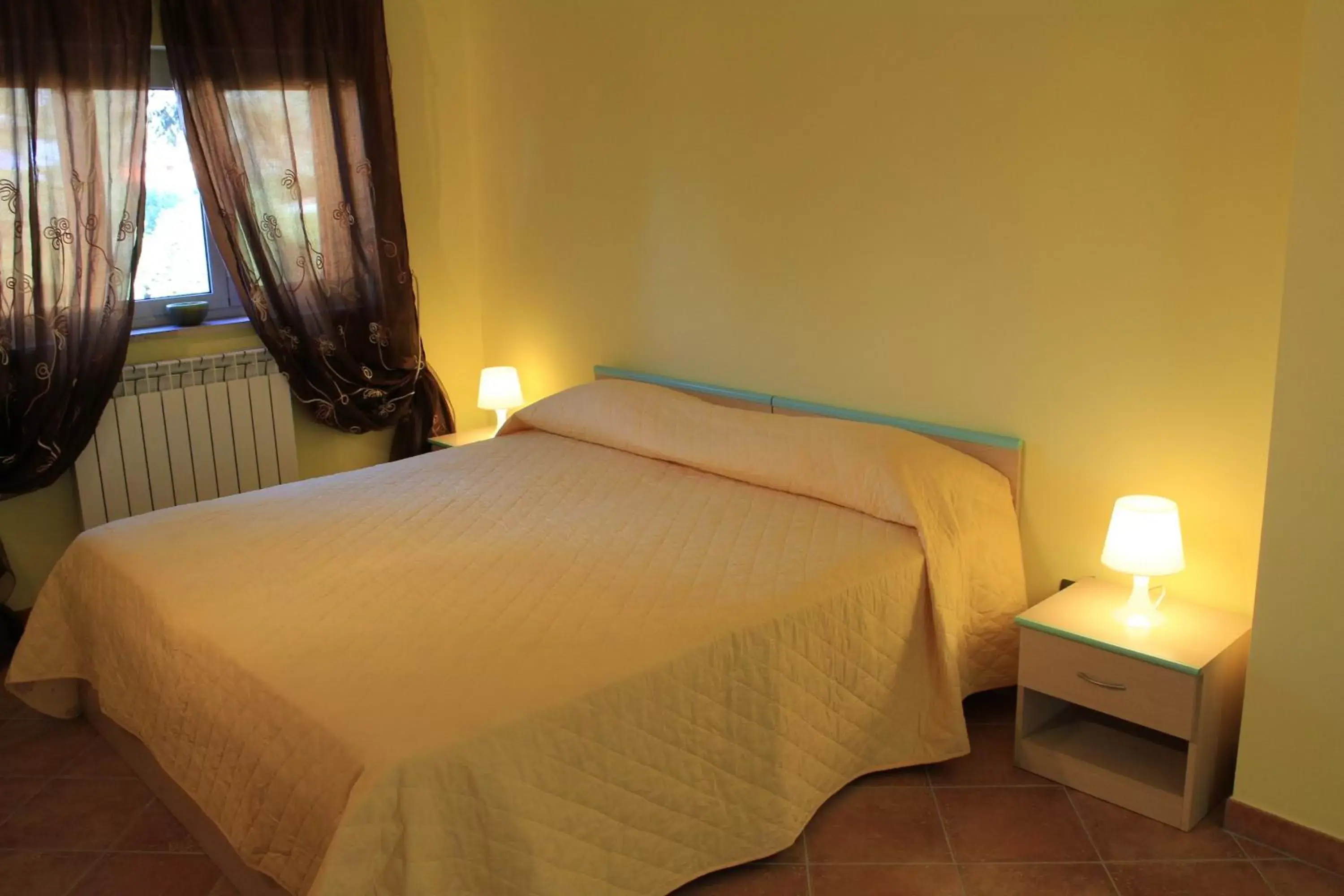 Quadruple Room - single occupancy in Il sottosopra Quadruple Room - single occupancy in Il sottosopra