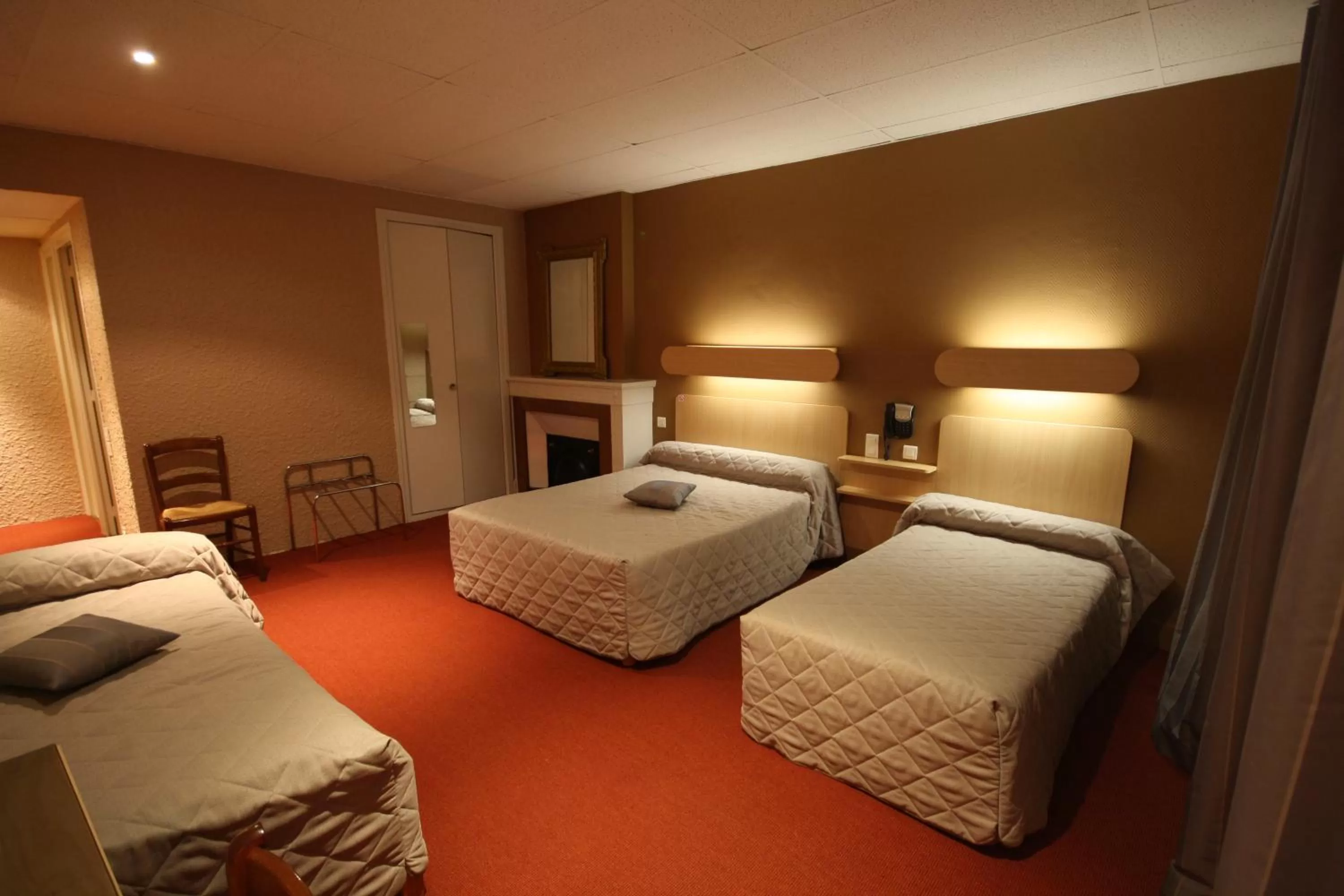 Photo of the whole room, Bed in Logis Hotel L'ange Couronne