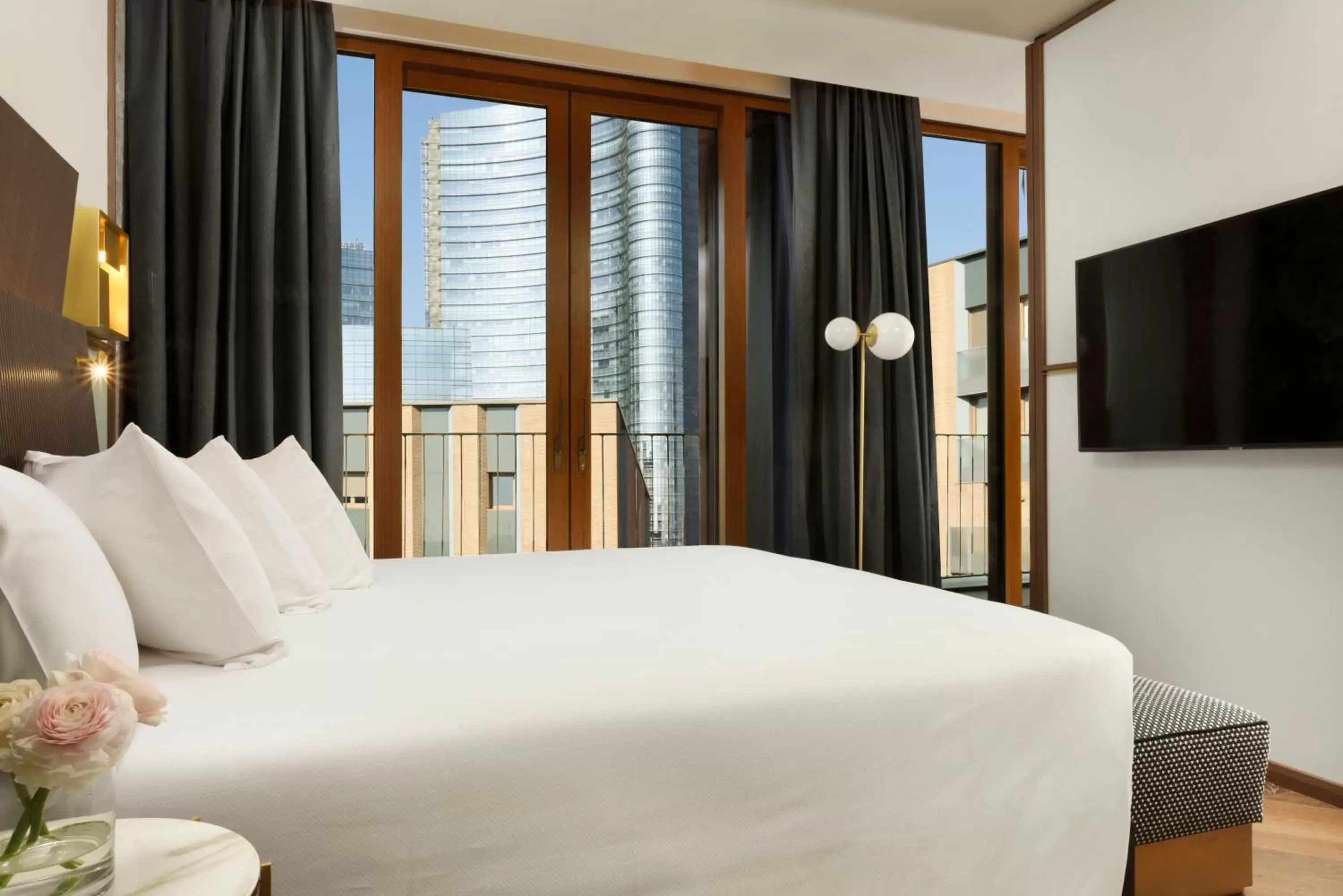 Junior Suite Room with Extra Bed - City View in Milano Verticale | UNA Esperienze Junior Suite Room with Extra Bed - City View in Milano Verticale | UNA Esperienze