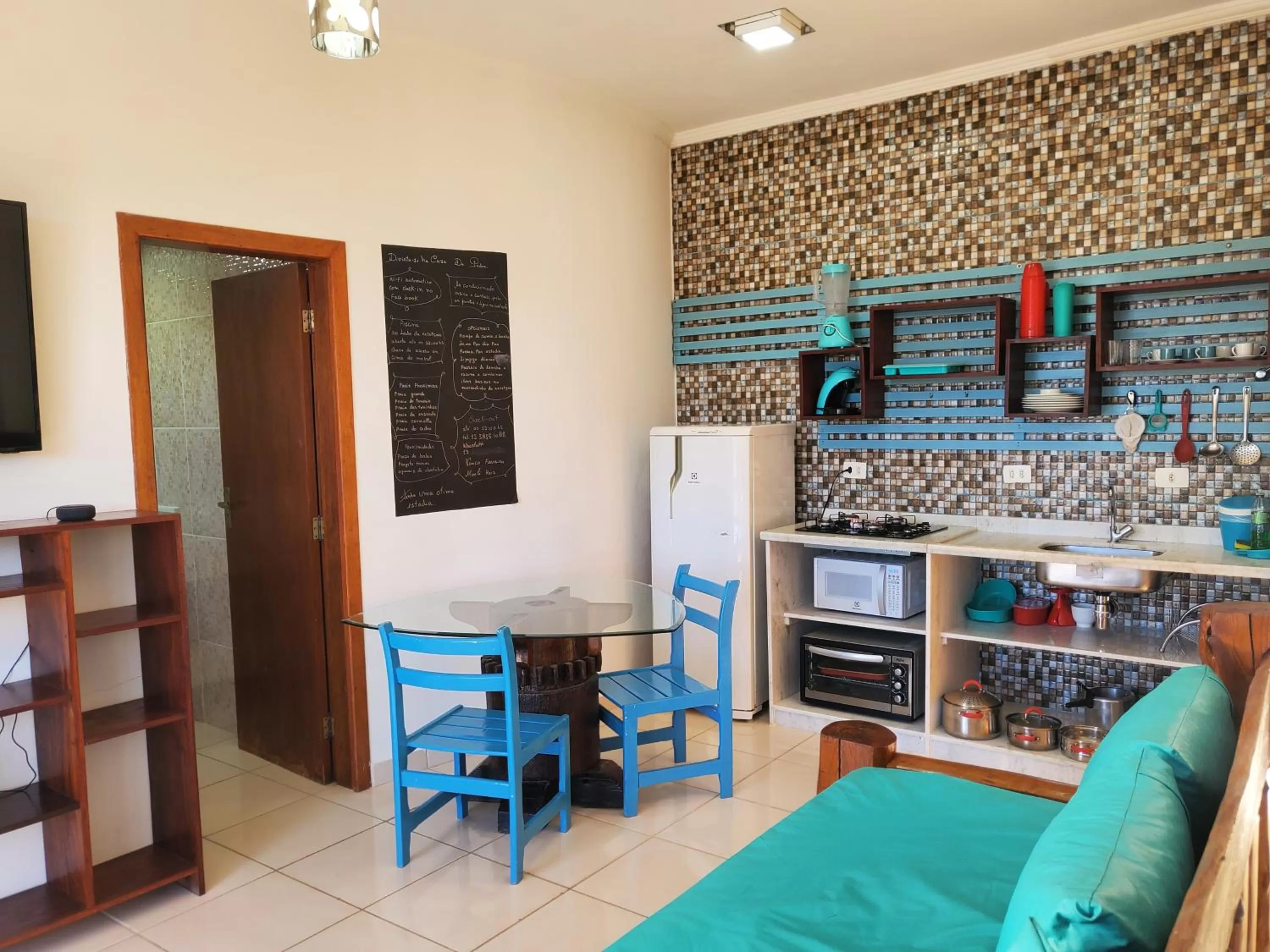 Kitchen or kitchenette in Apartamentos Casa da Pedra