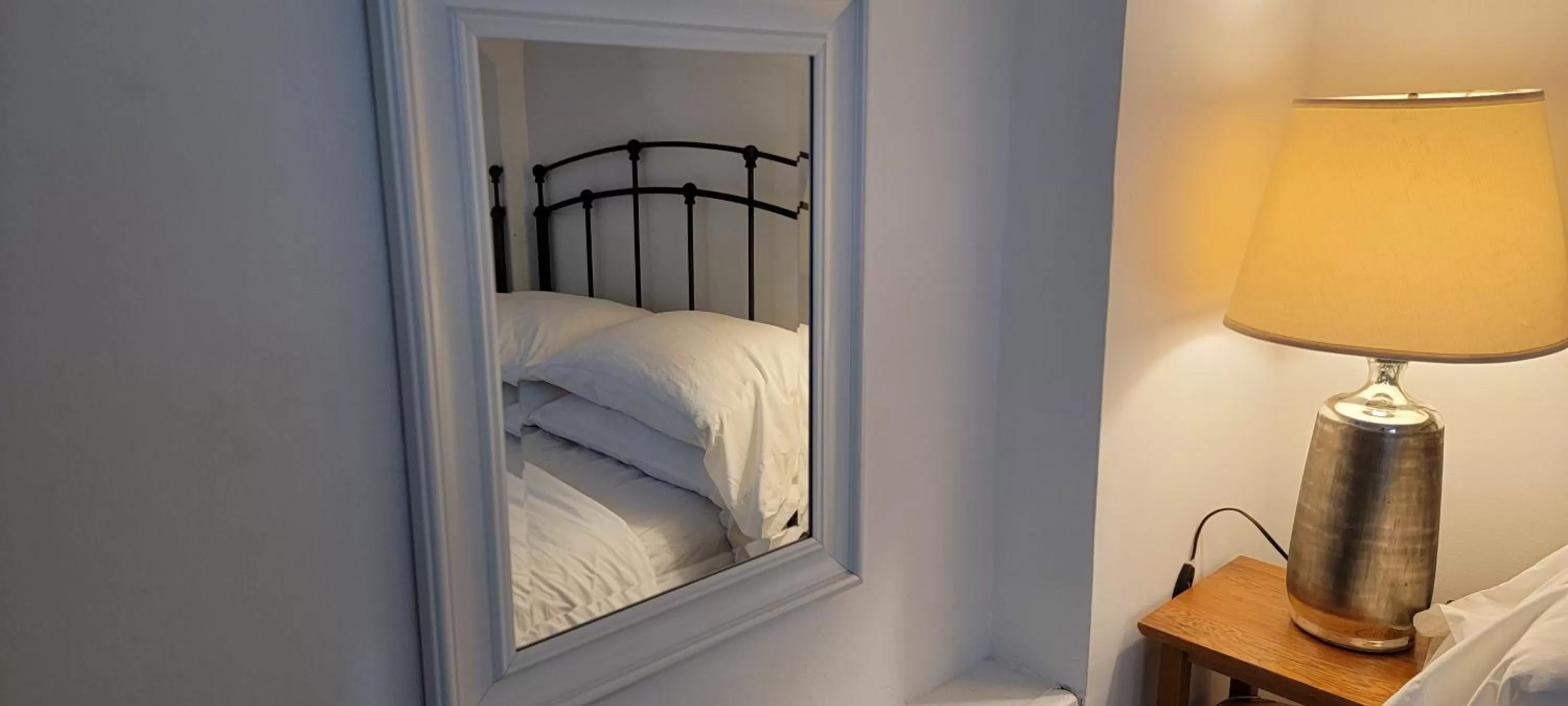 Bed in Incentra Village Hotel