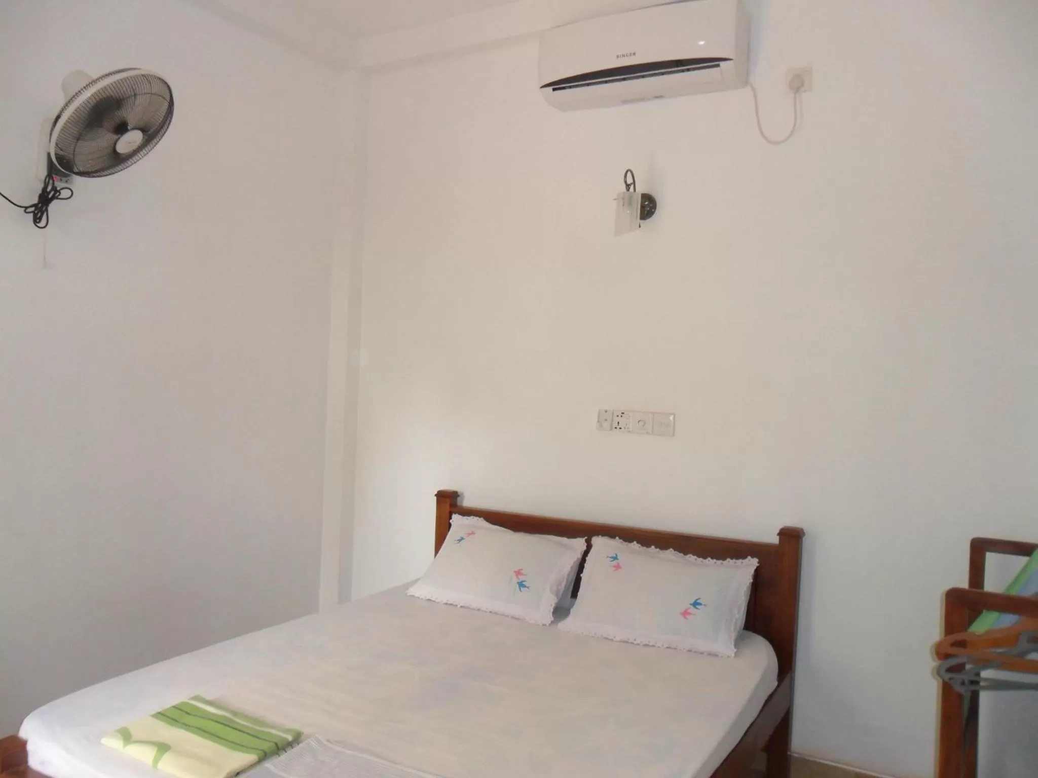 Photo of the whole room, Bed in Pearl Resort Mirissa