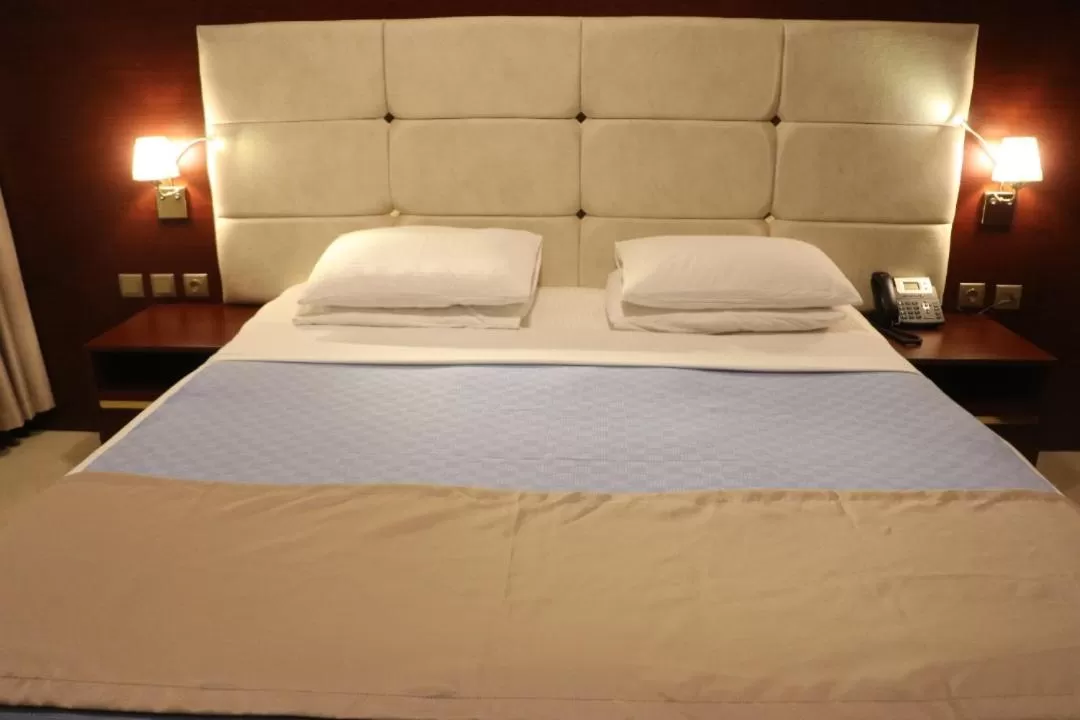 Bed in Golden Airport Hotel