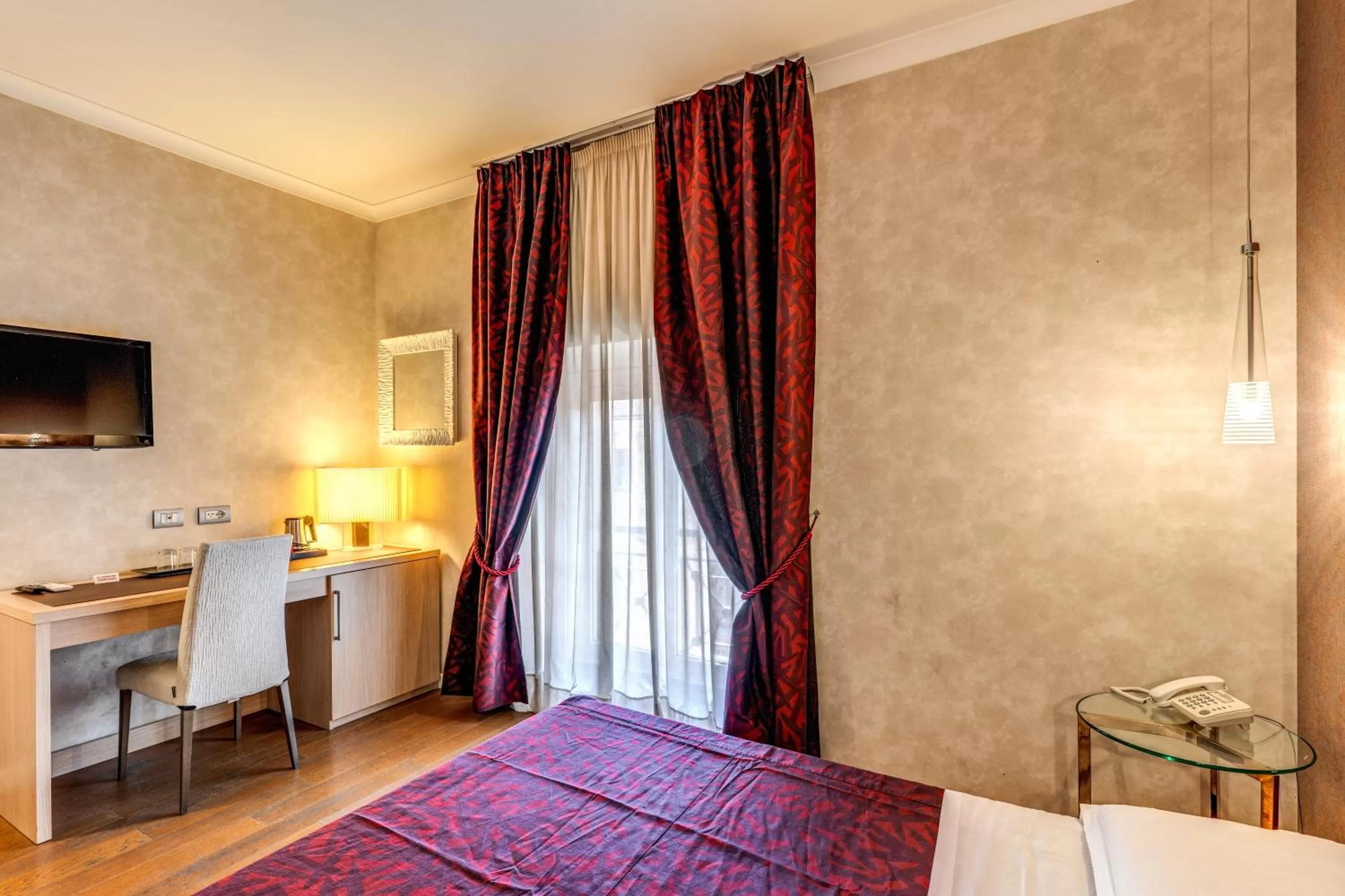 Bed in Roma Boutique Hotel