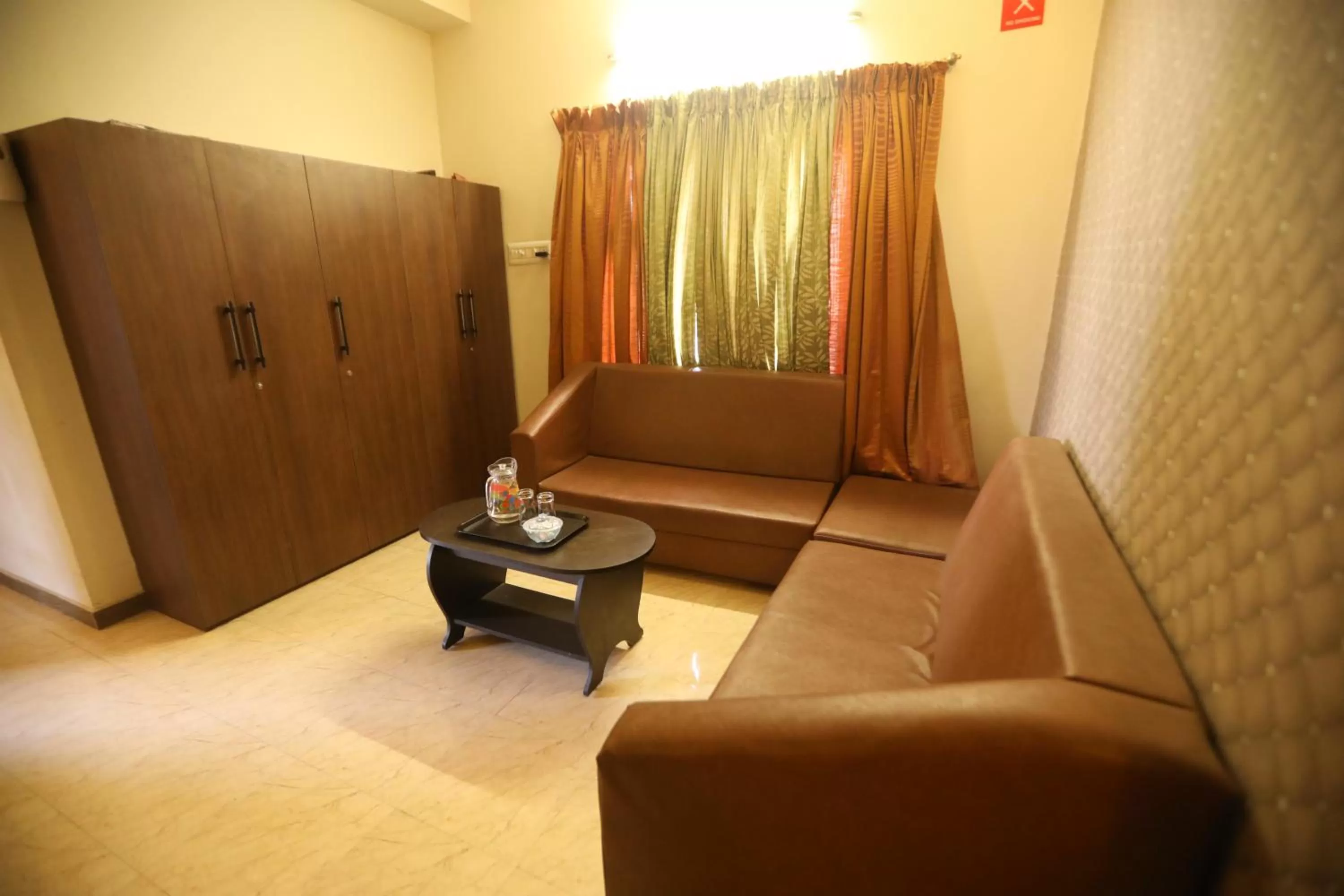 Seating area in Nestlay Rooms Ambattur