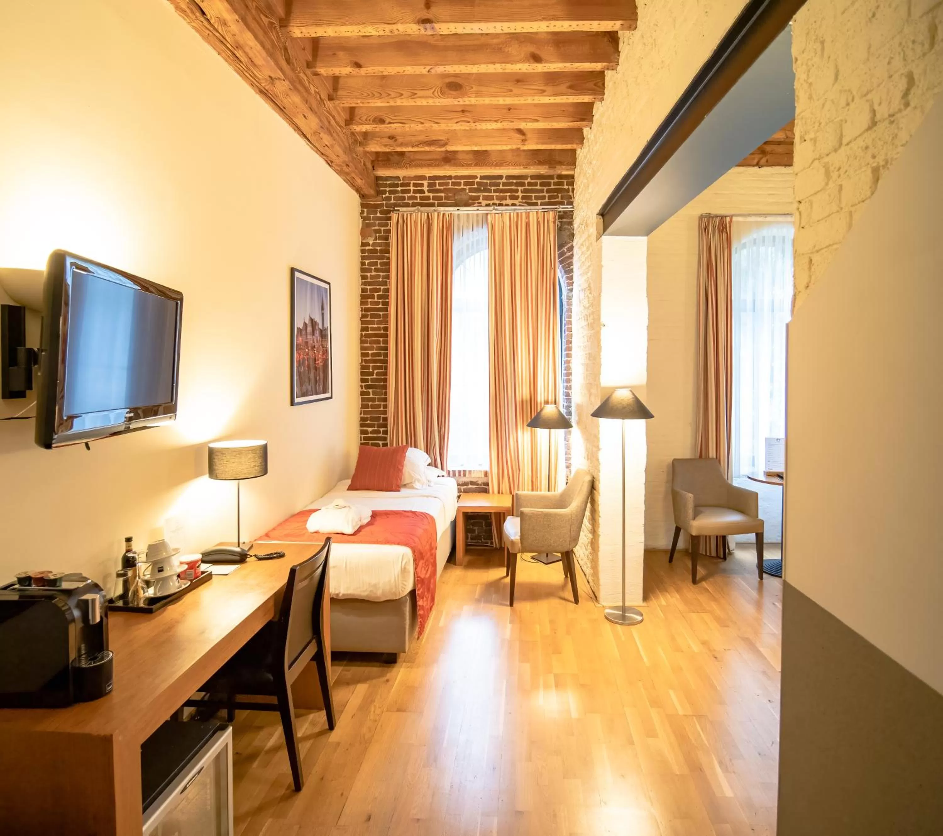 Bed in Ghent River Hotel