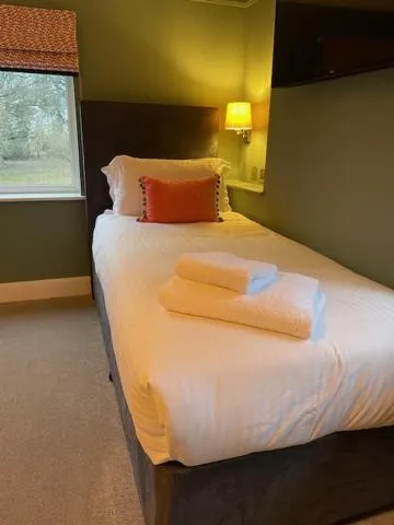 Bedroom, Bed in Cottesmore Hotel Golf & Country Club