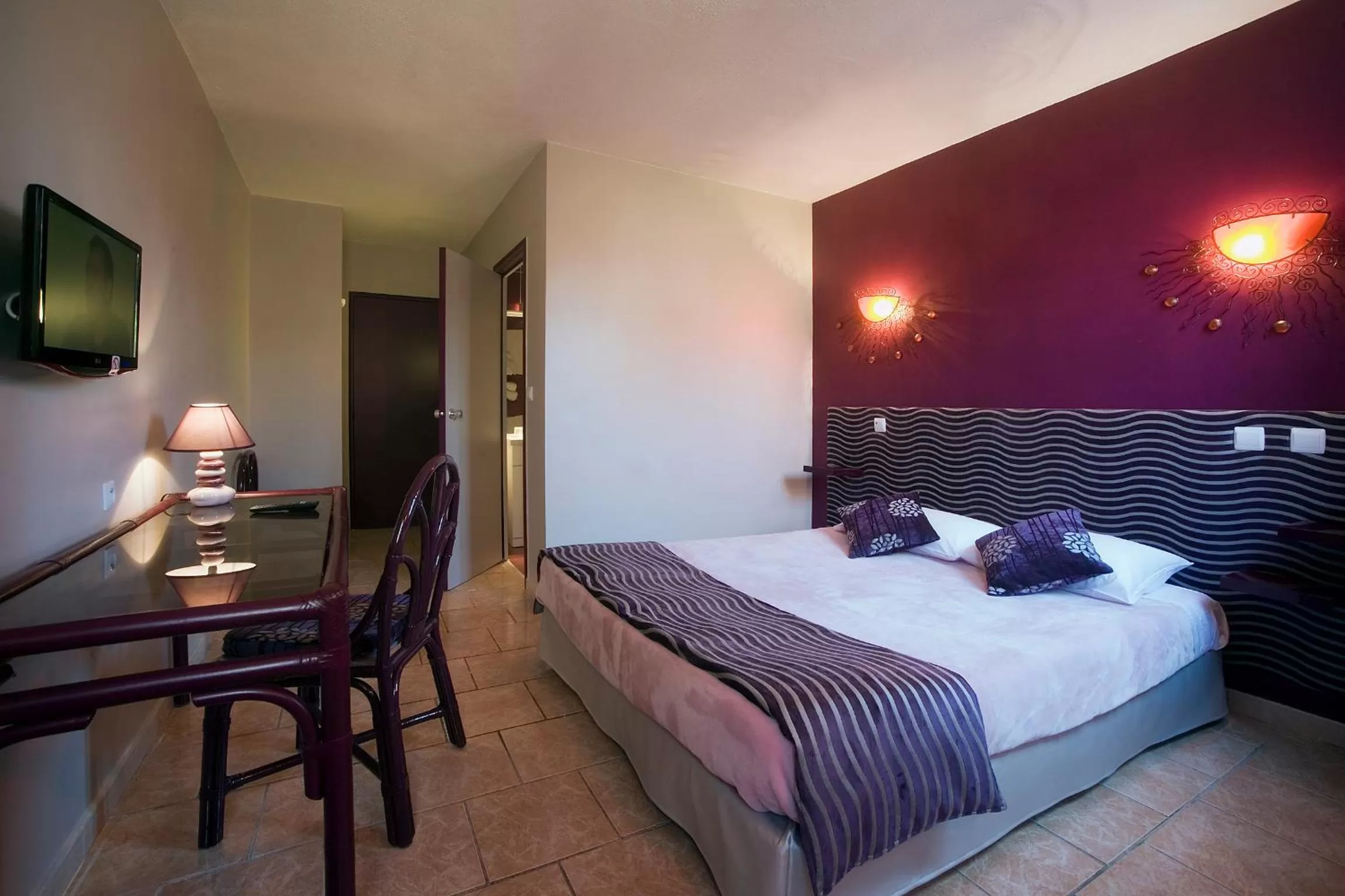 Bed in Tropic Hôtel