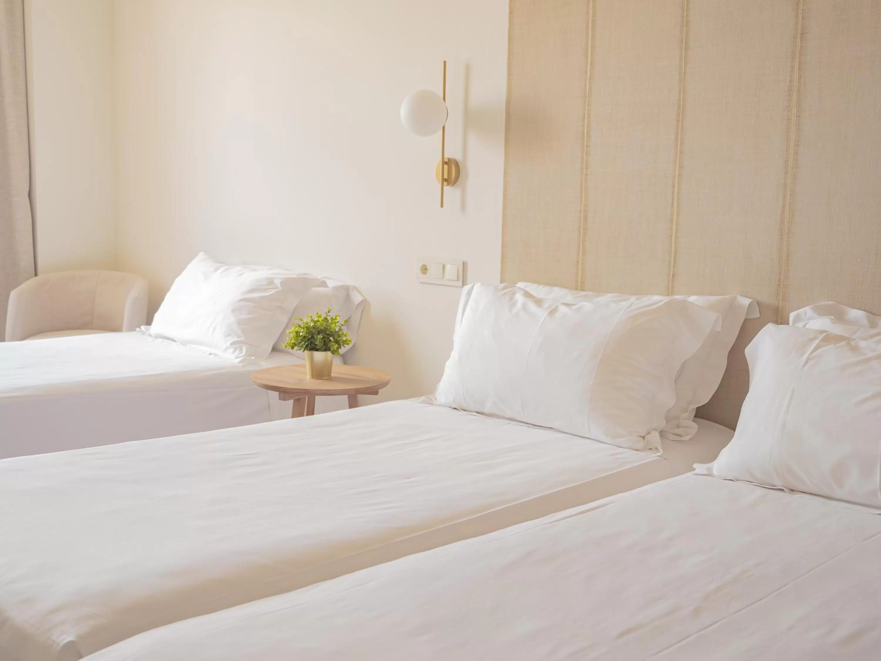 Bed in Hotel Oriente