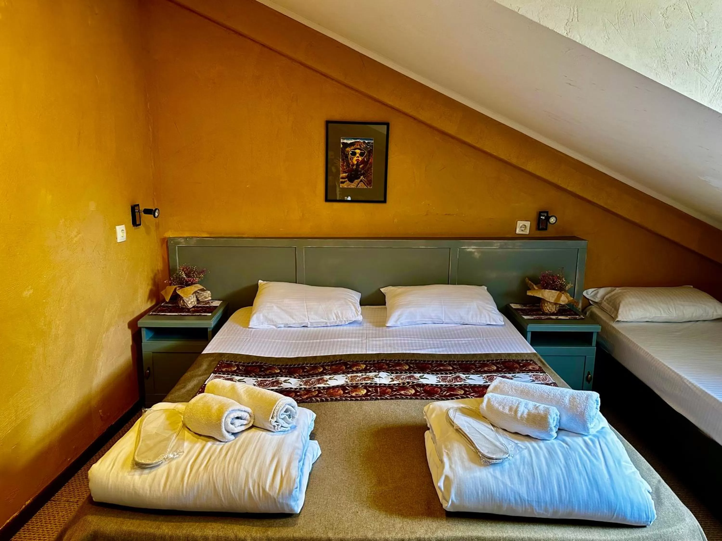 Bed in Kindli Boutique Hotel