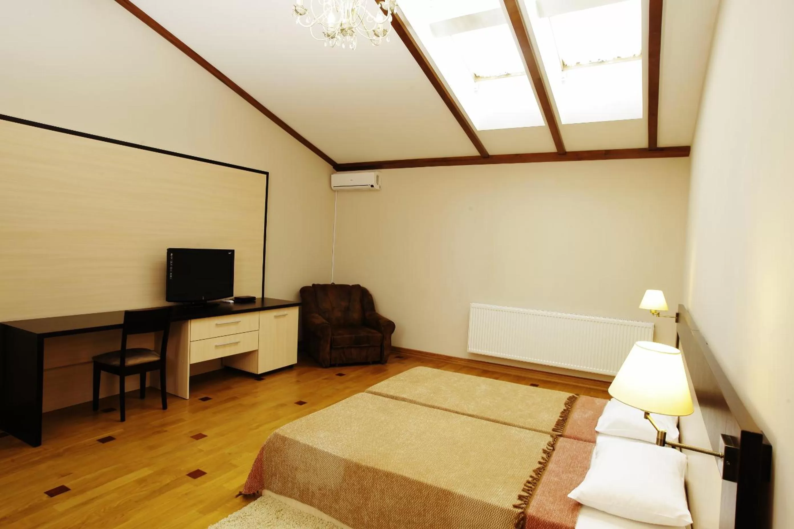 Bed in Mini-Hotel Under The Roof