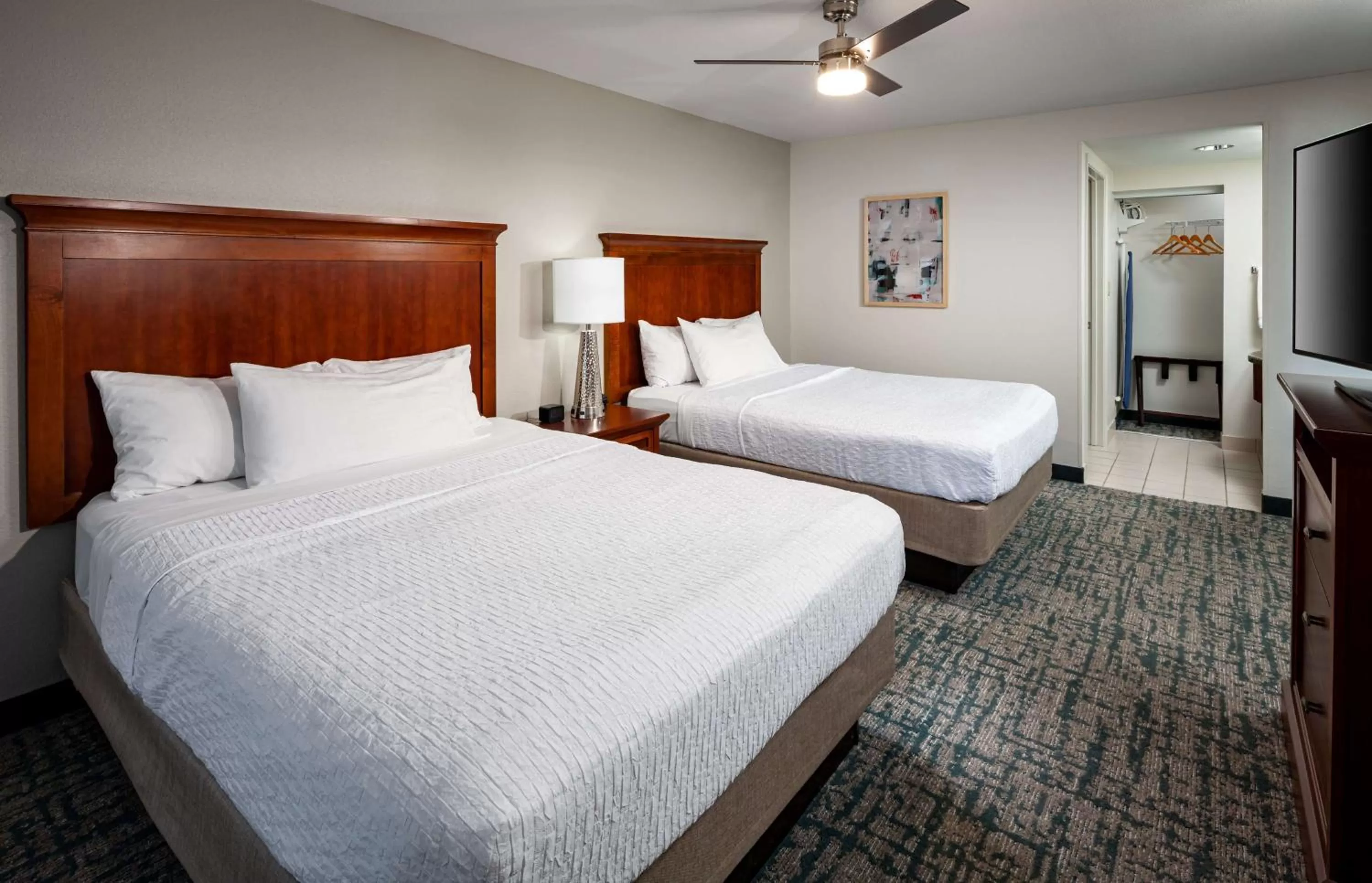 Bed in Homewood Suites by Hilton Jacksonville-South/St. Johns Ctr.
