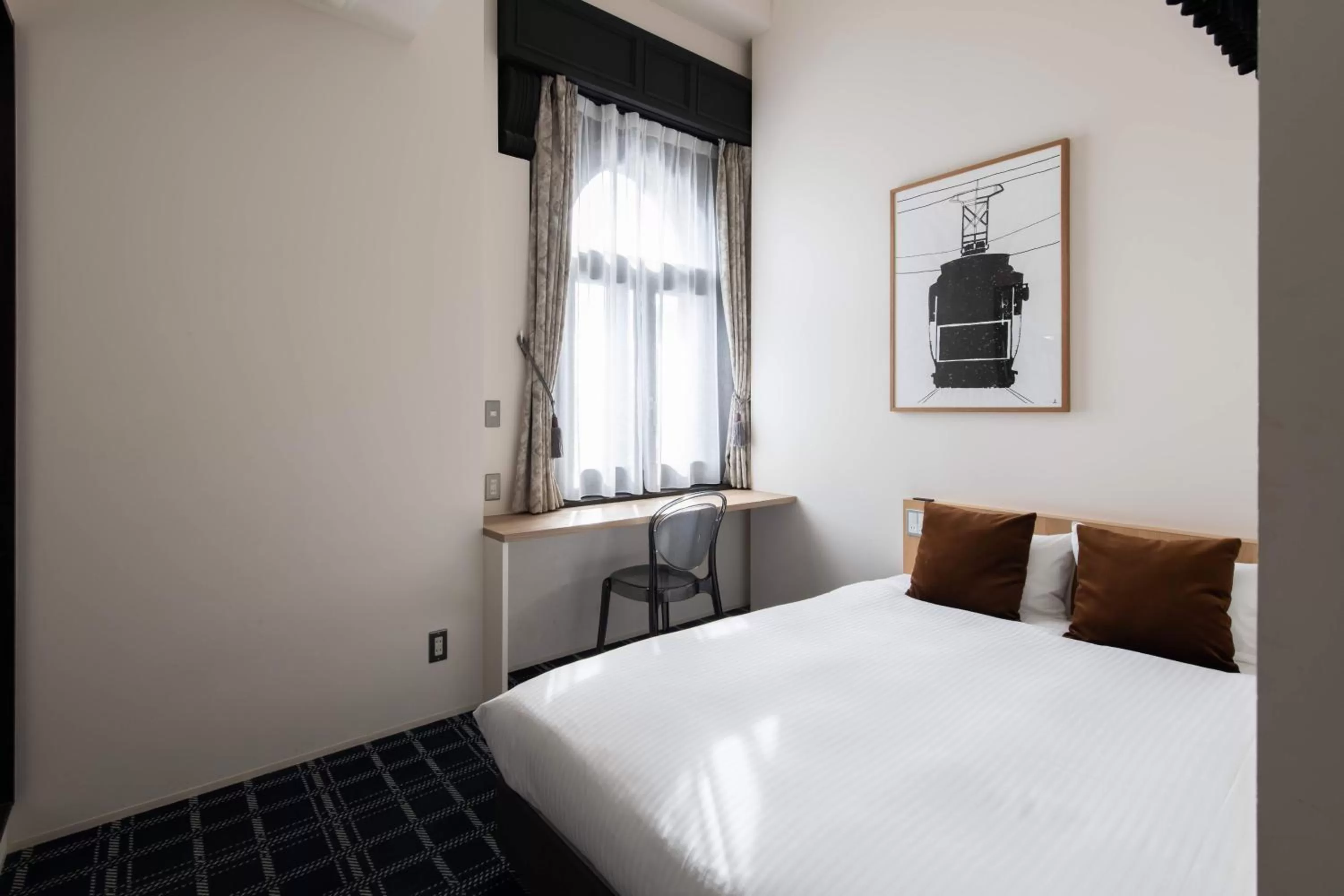 Bed in HakoBA Hakodate by THE SHARE HOTELS