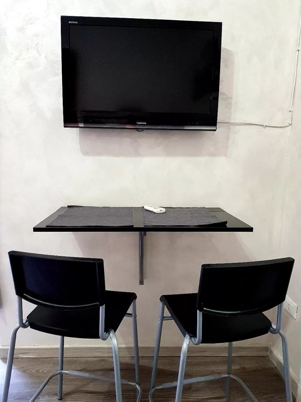 TV and multimedia, TV/Entertainment Center in B&B BellaNapoli