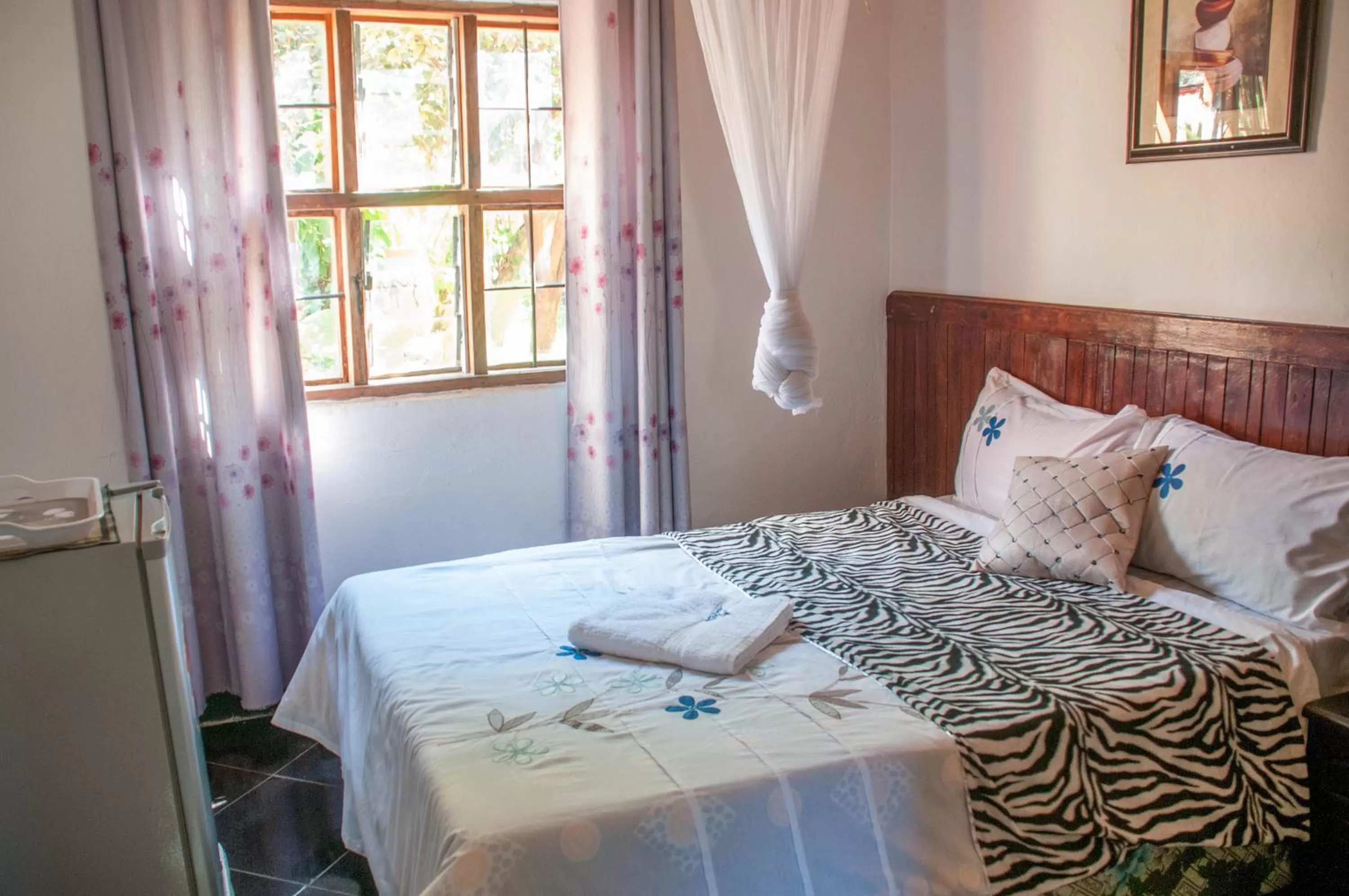Bed in Okavango Lodge