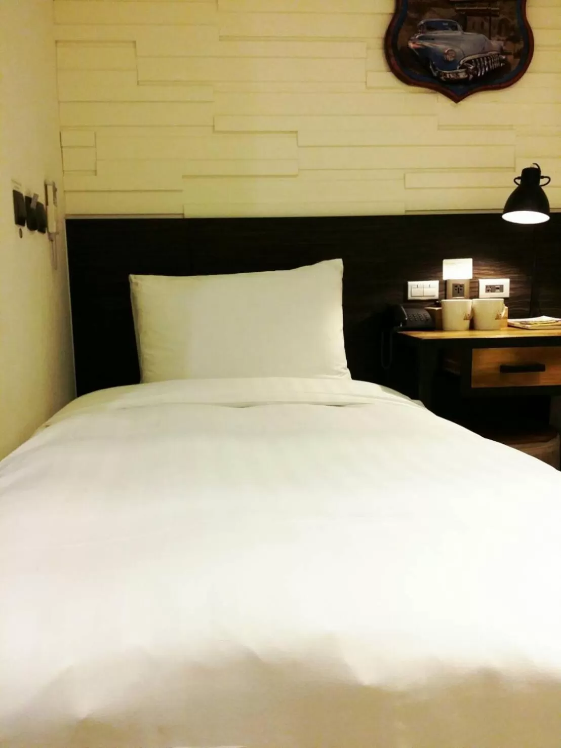 Bed in Re-Change Hotel Taipei