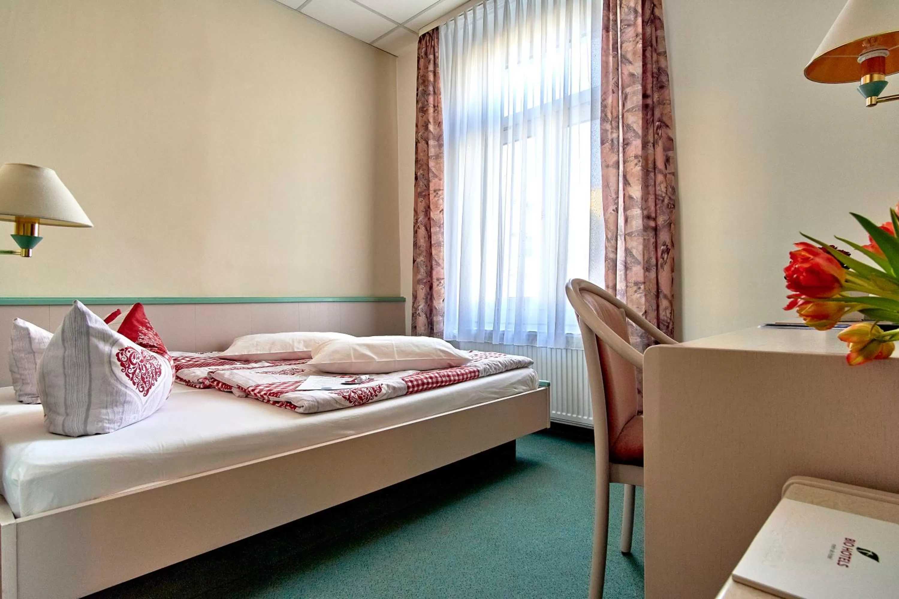 Photo of the whole room, Bed in Biohotel Amadeus