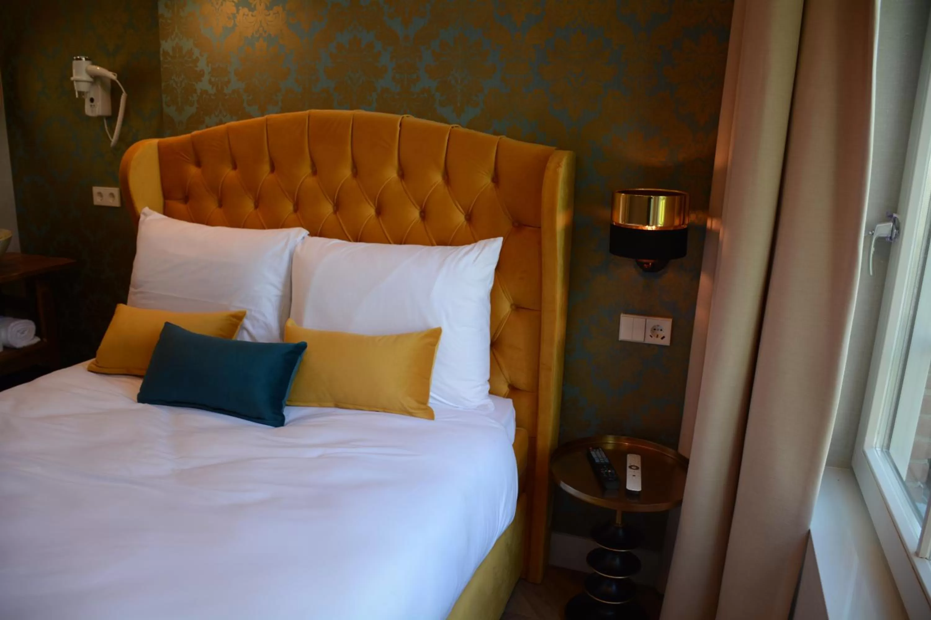 Bed in The IF Boutique hotel