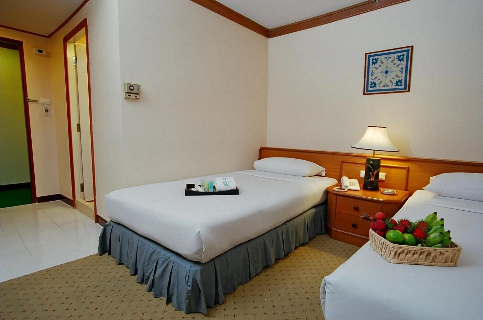 Bed in Wall Street Inn, Bangkok