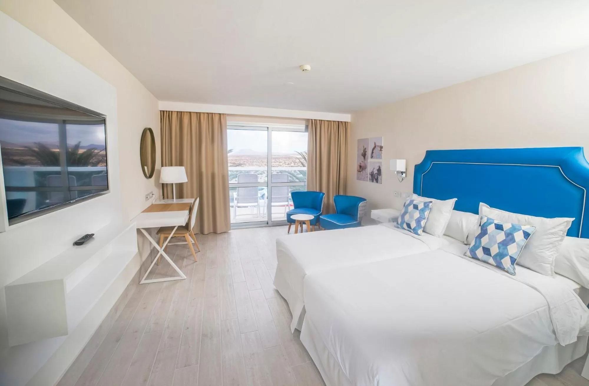 Seating area, Bed in Hotel Boutique TAO Caleta Mar