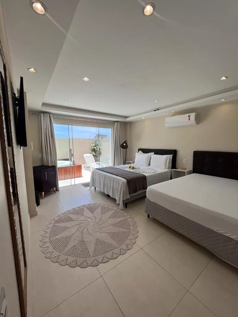 Bed in Pousada Arraial Tropical