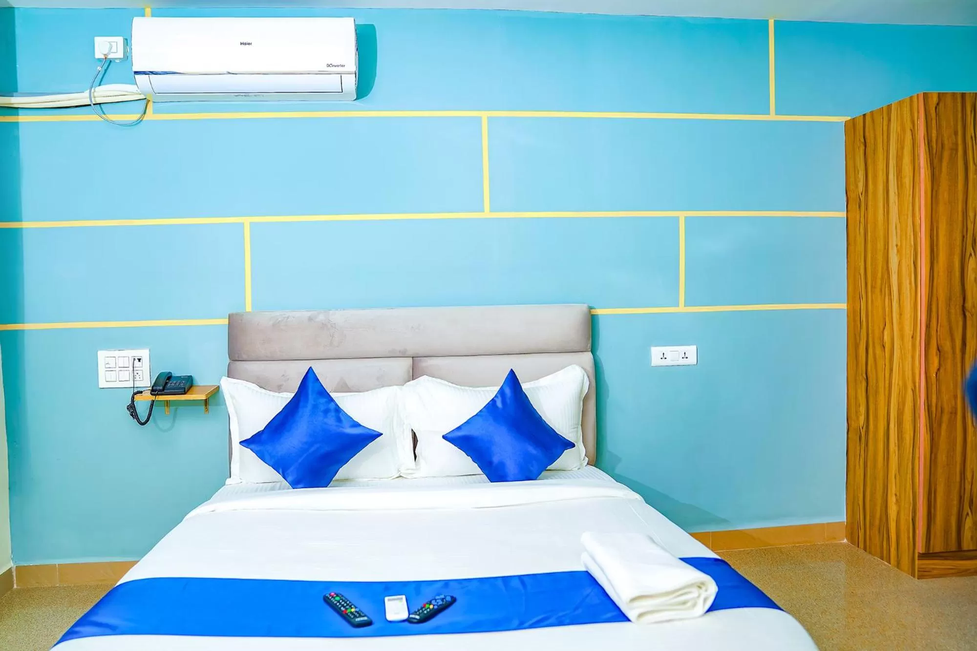 Bed in FabHotel JKC Grand