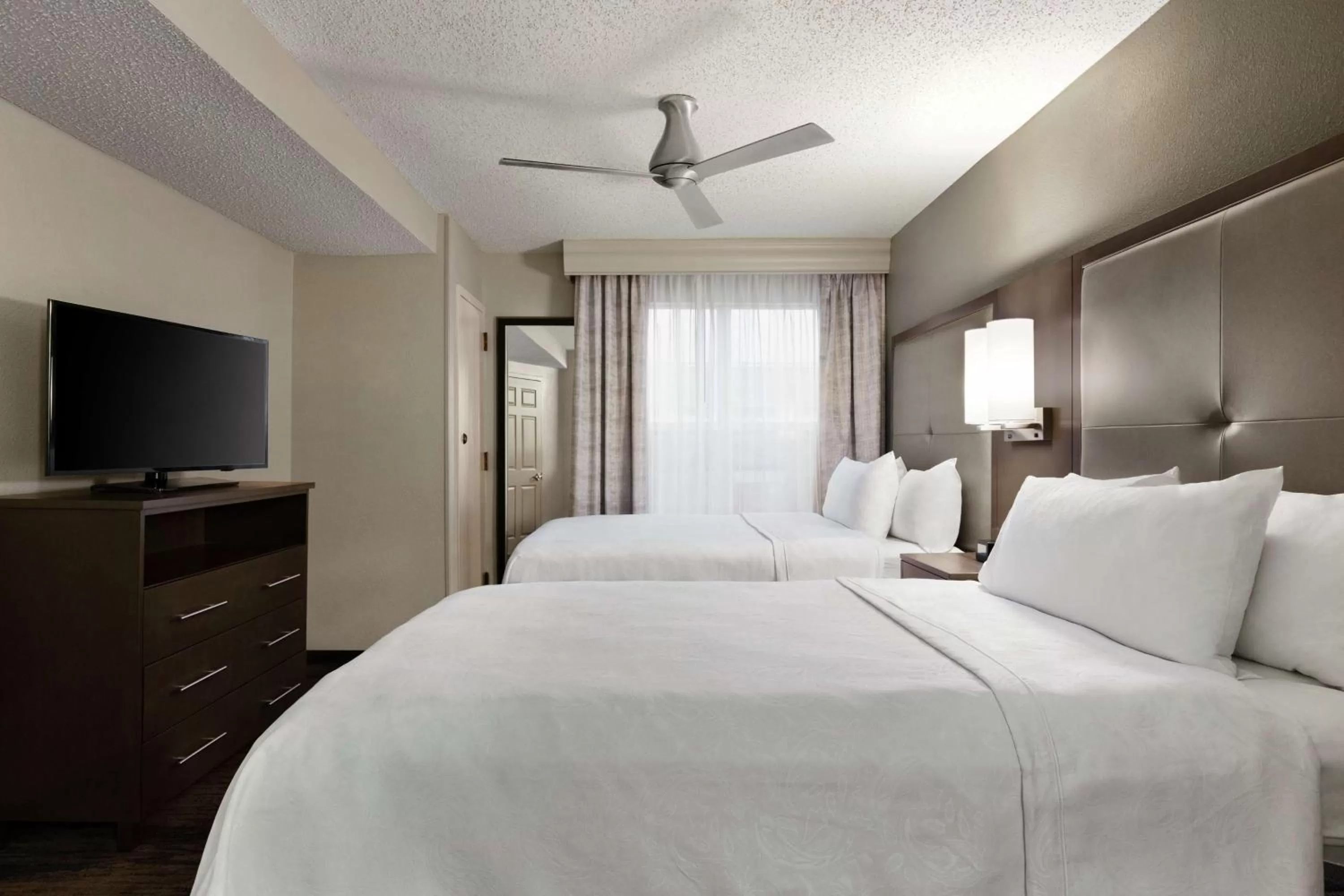 Bed in Homewood Suites by Hilton Dallas-Plano