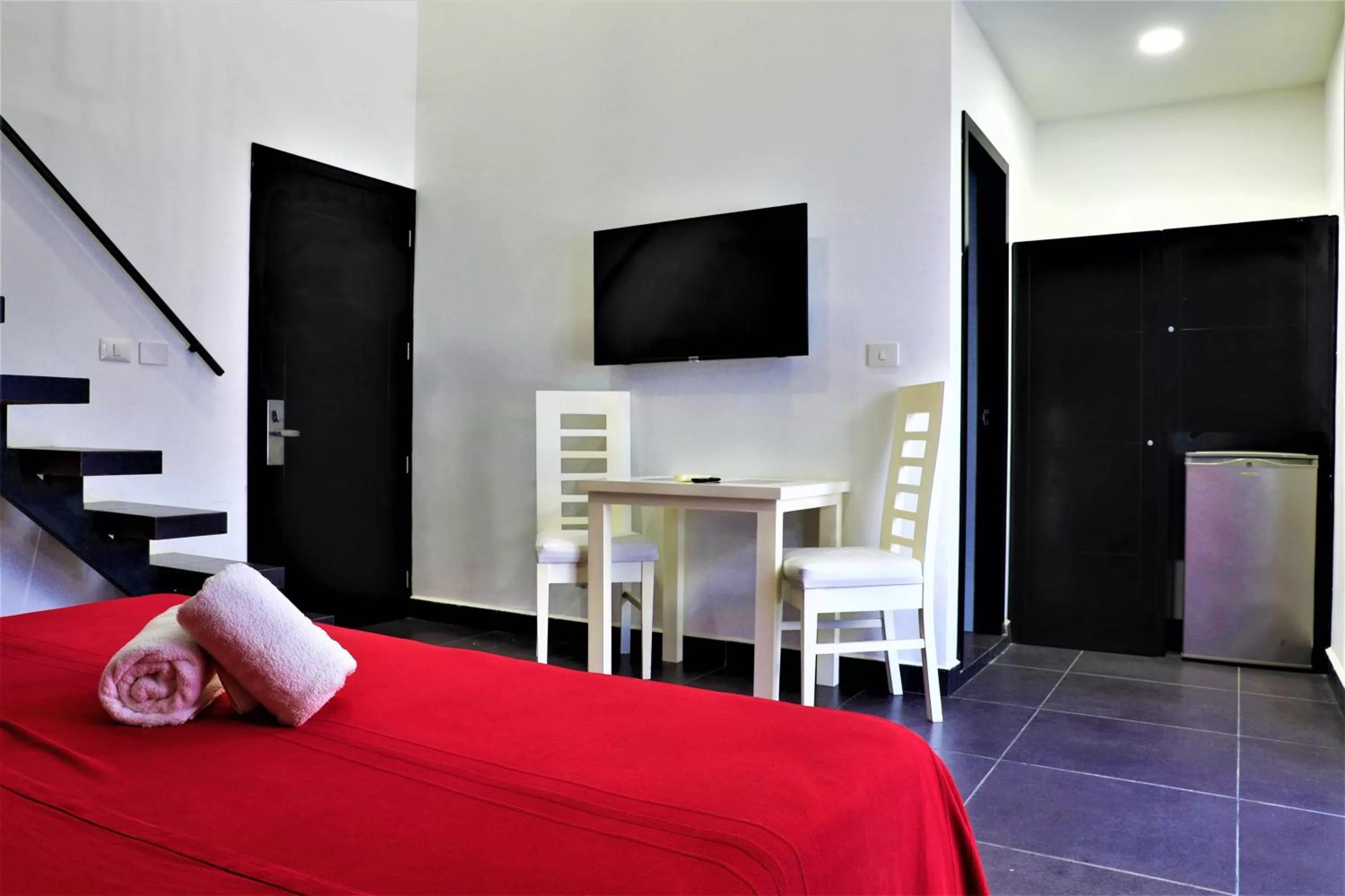 Photo of the whole room, Bed in Hotel Colonial Playa del Carmen