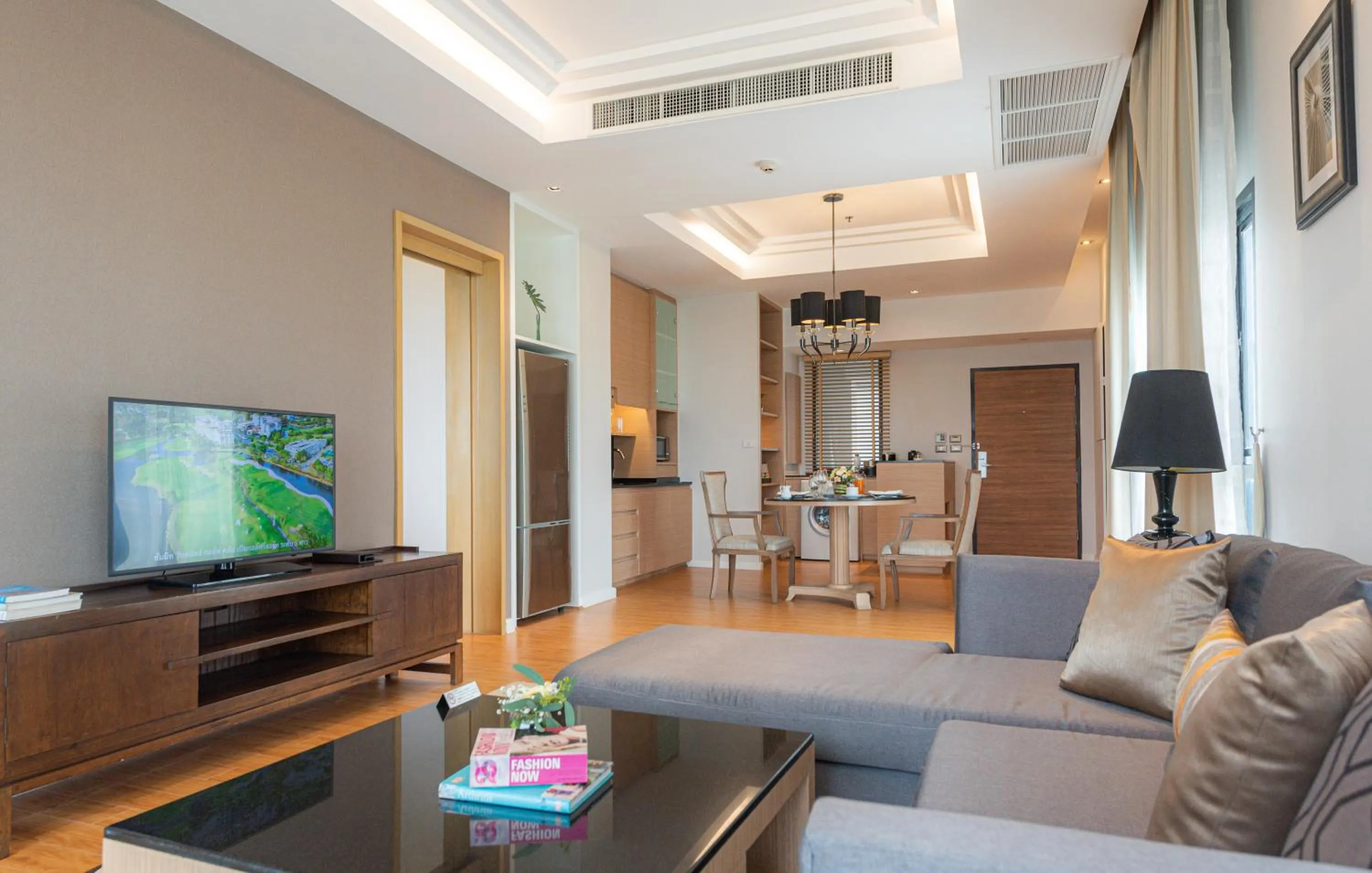 Living room in Summit Windmill Golf Suite Hotel at Suvarnabhumi