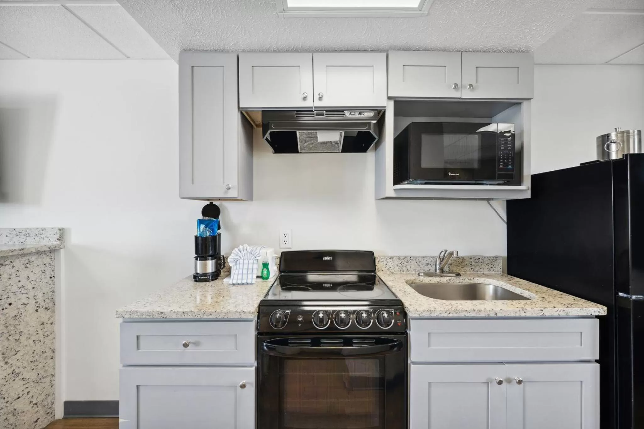 kitchen in Sugar Sands Beachfront Hotel, a By The Sea Resort