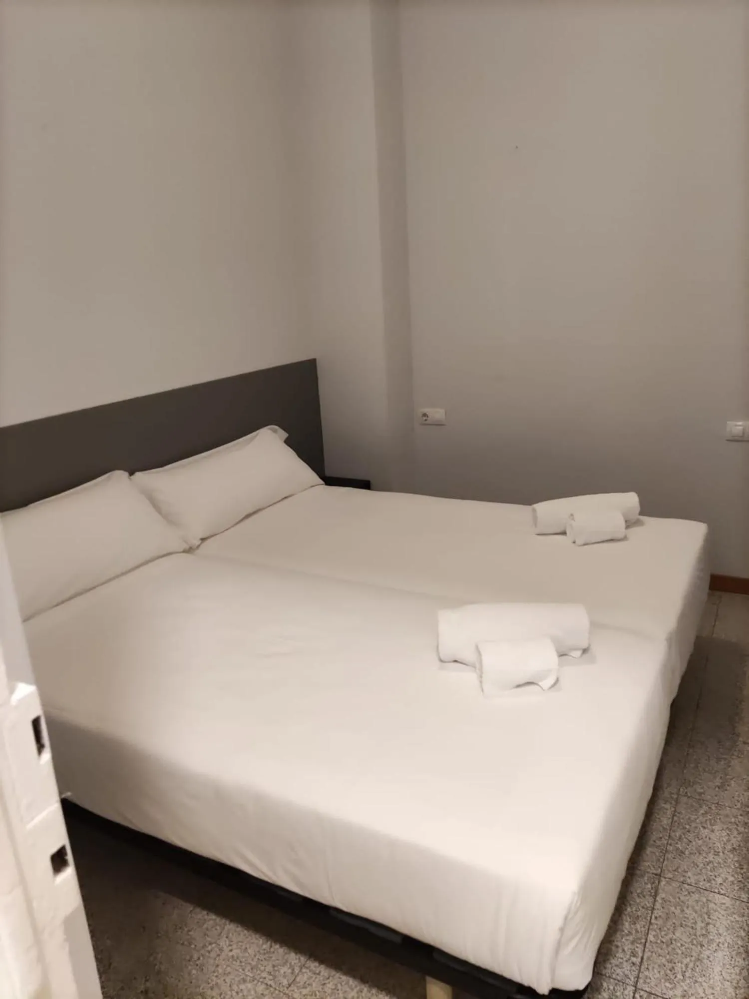 Bed in Hotel Monegal