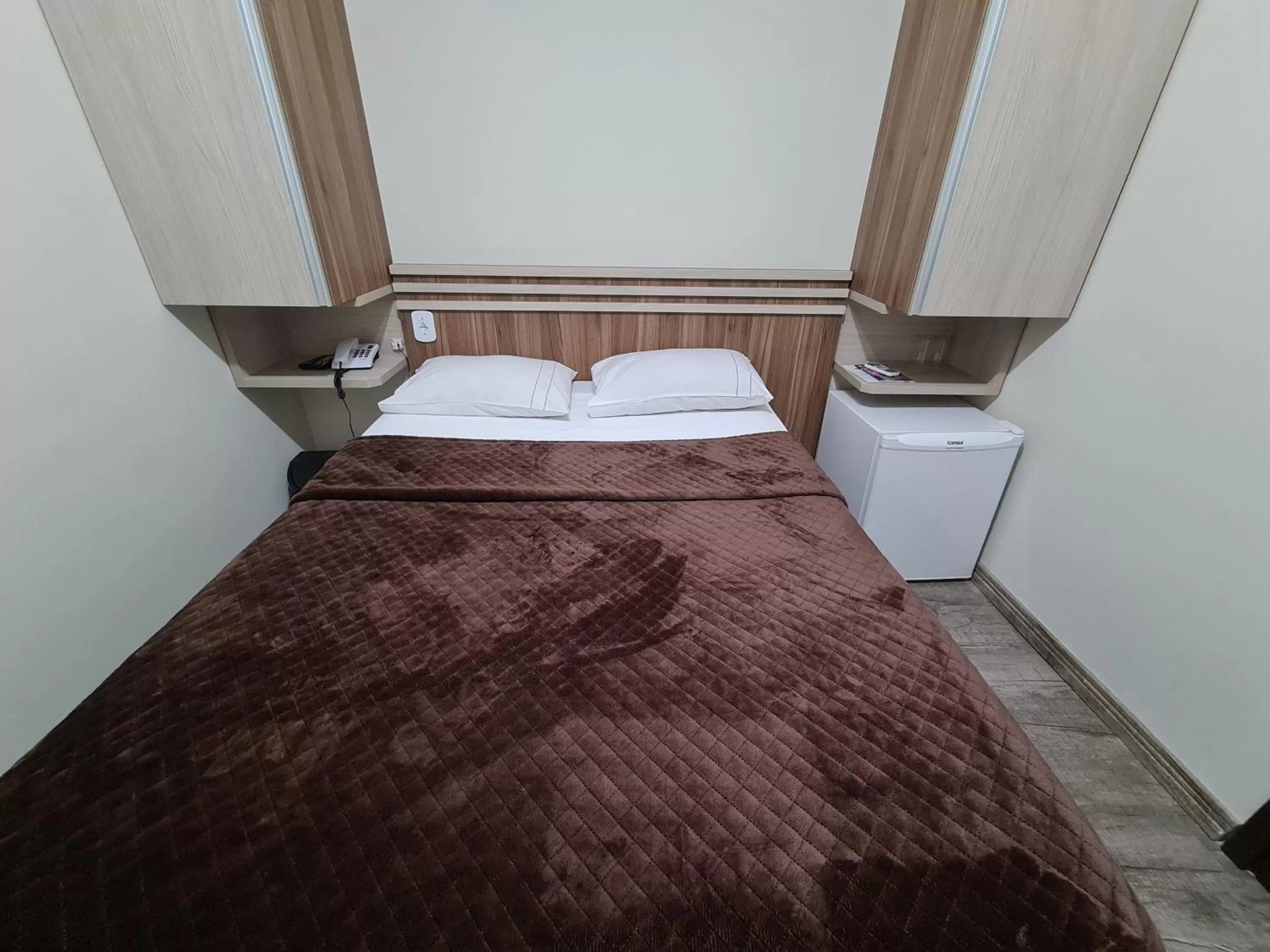 Bed in Bella Augusta Hotel