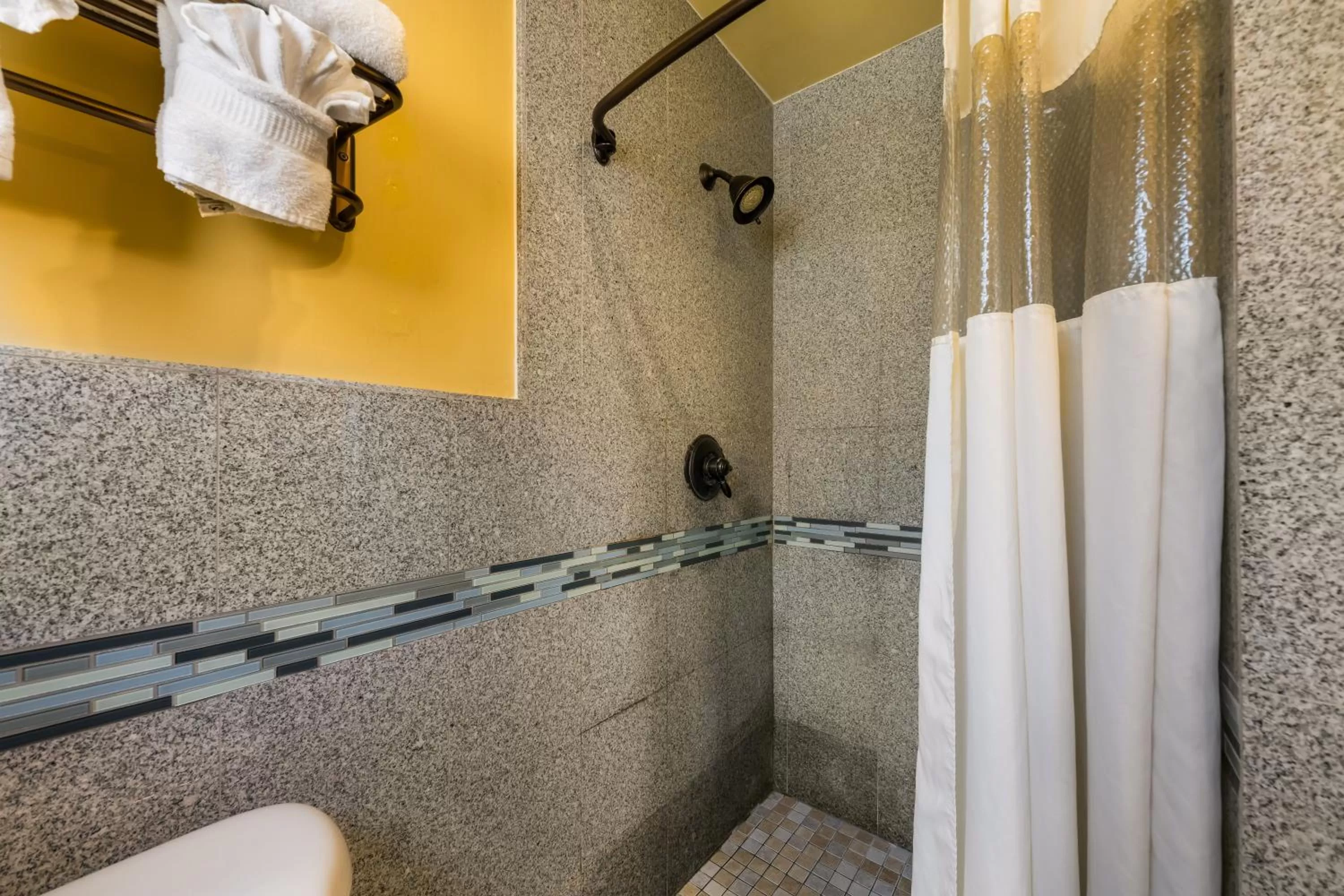 Shower in Carmel Inn & Suites