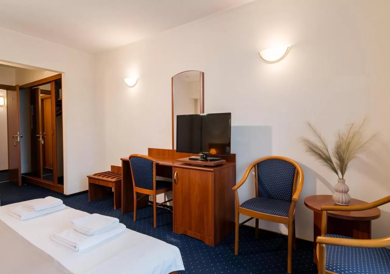 Bed in Hotel Excelsior By TimHotels