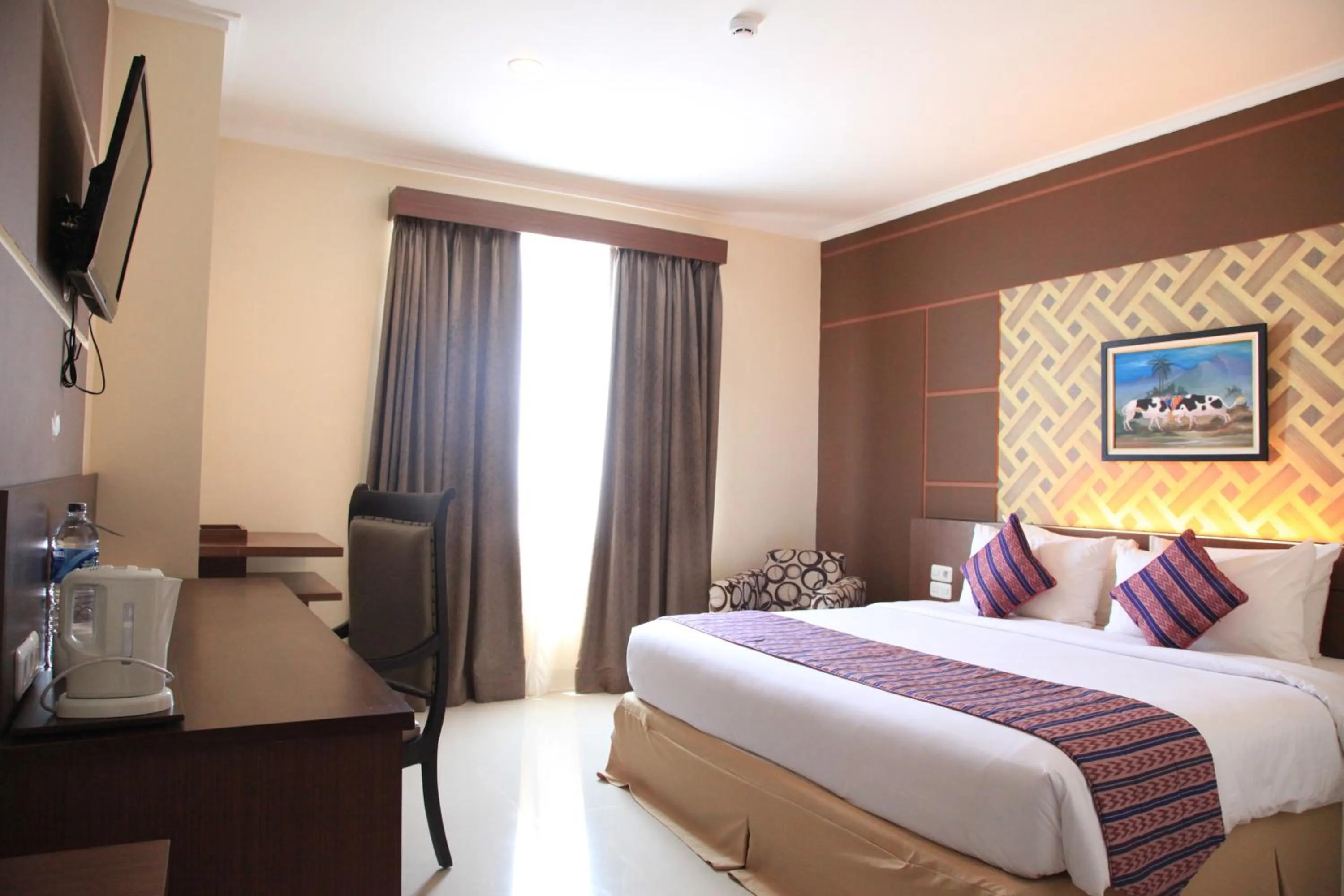 Bed in Aerotel Smile Losari