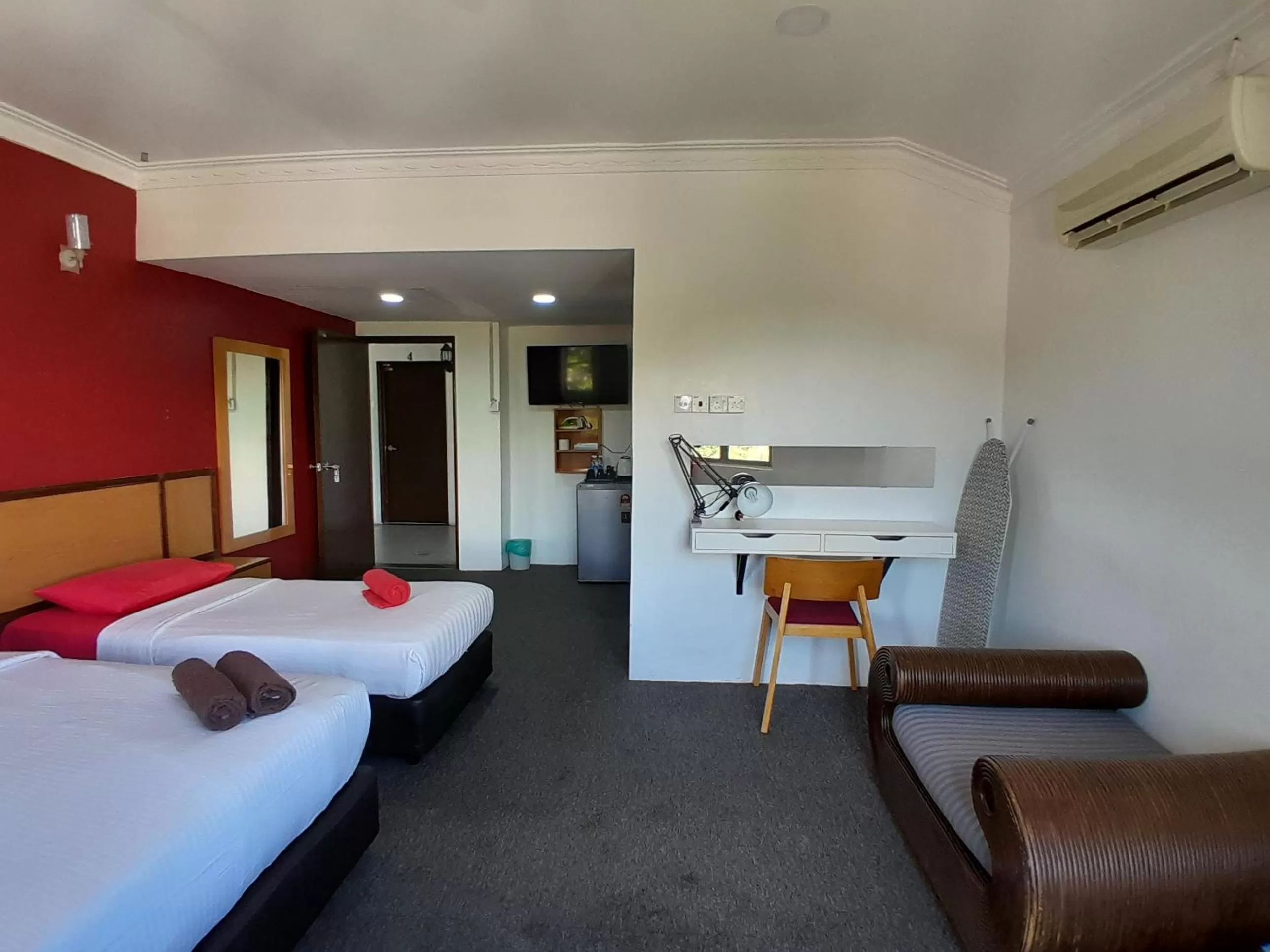 Bed in THE ZULEY HERITAGE HOTEL