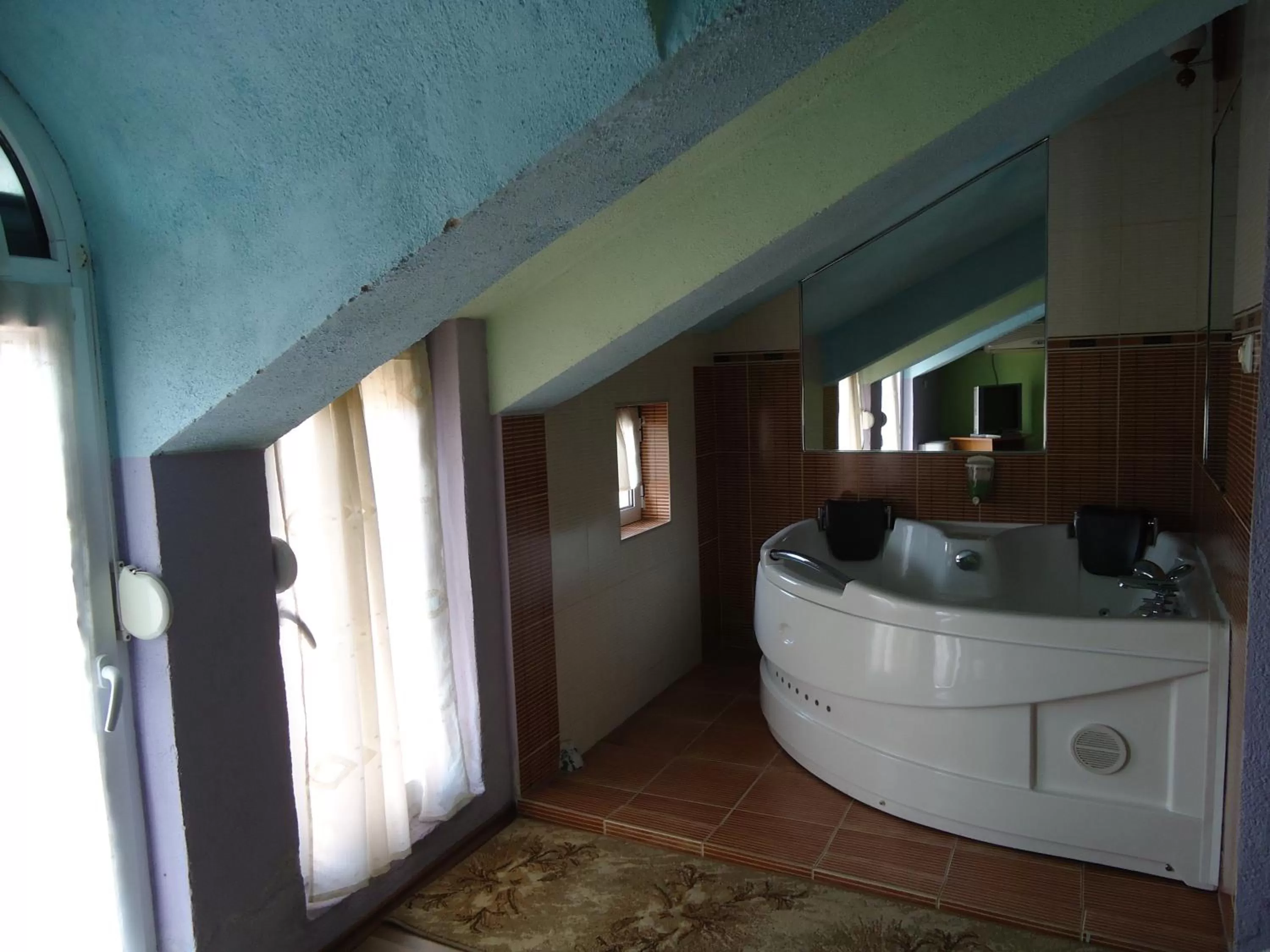 Bathroom in Dionis Hotel