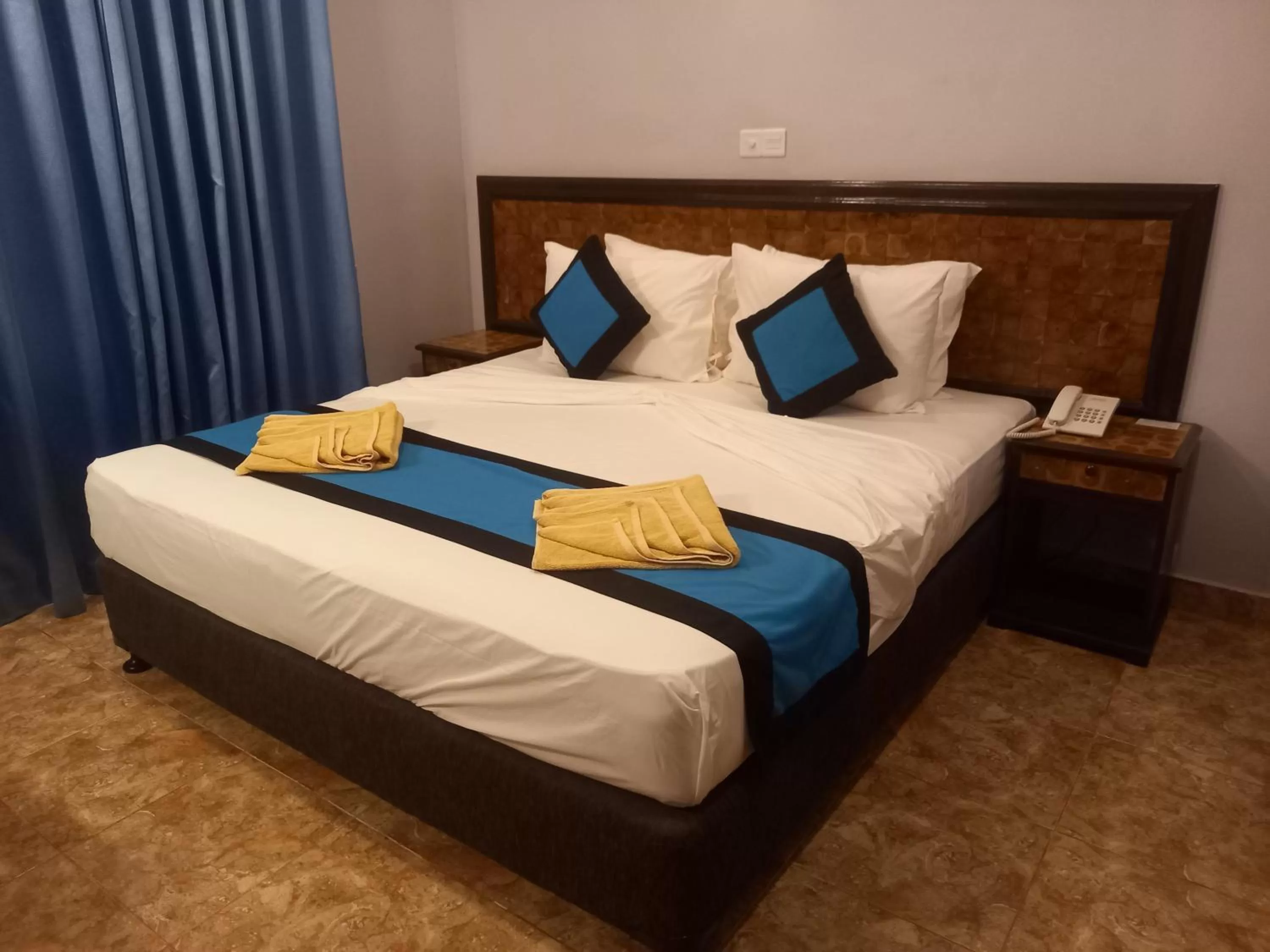 Bed in Blue Sand Beach Resort