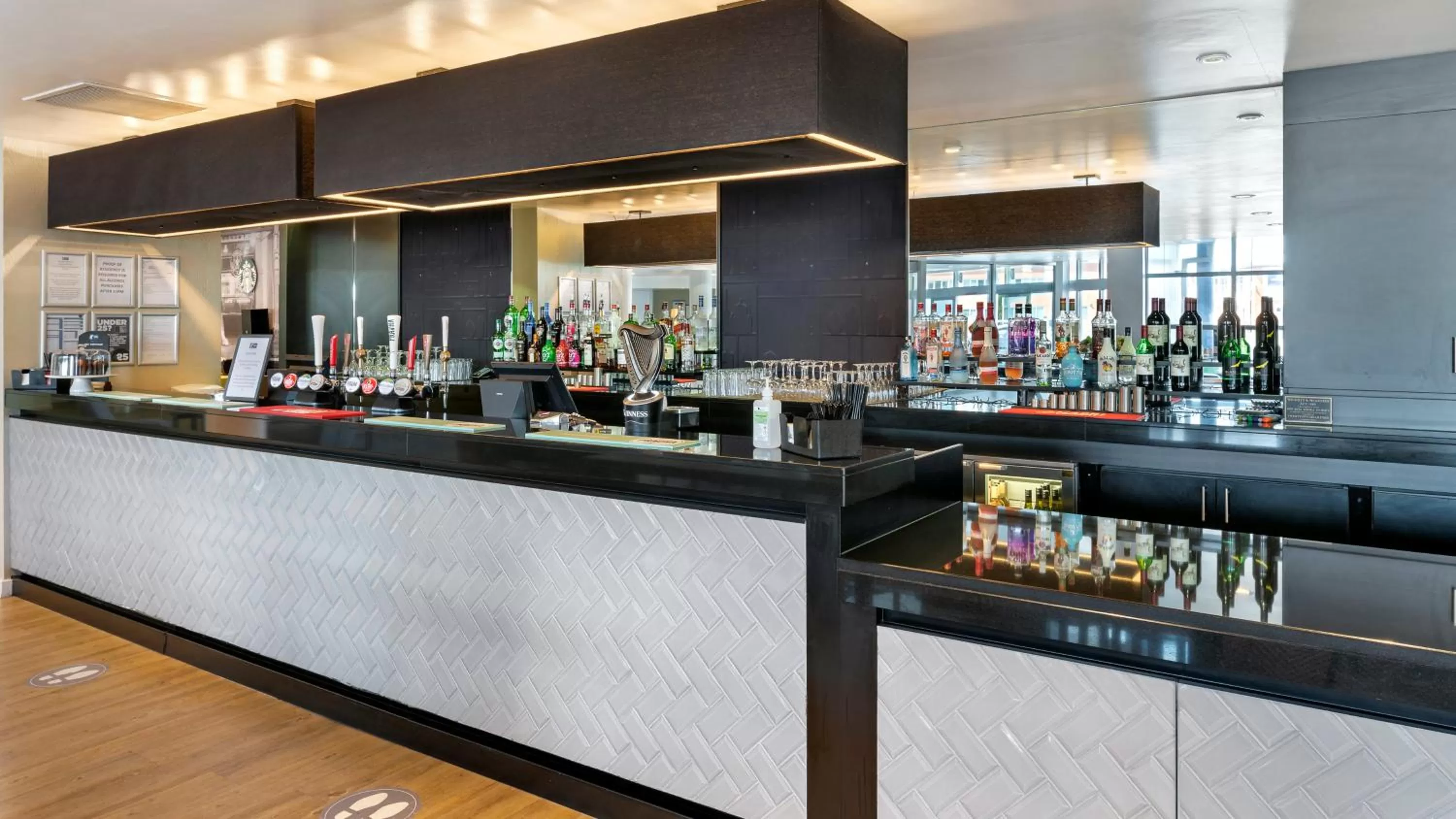 Lounge or bar in Holiday Inn Express Leigh - Sports Village by IHG